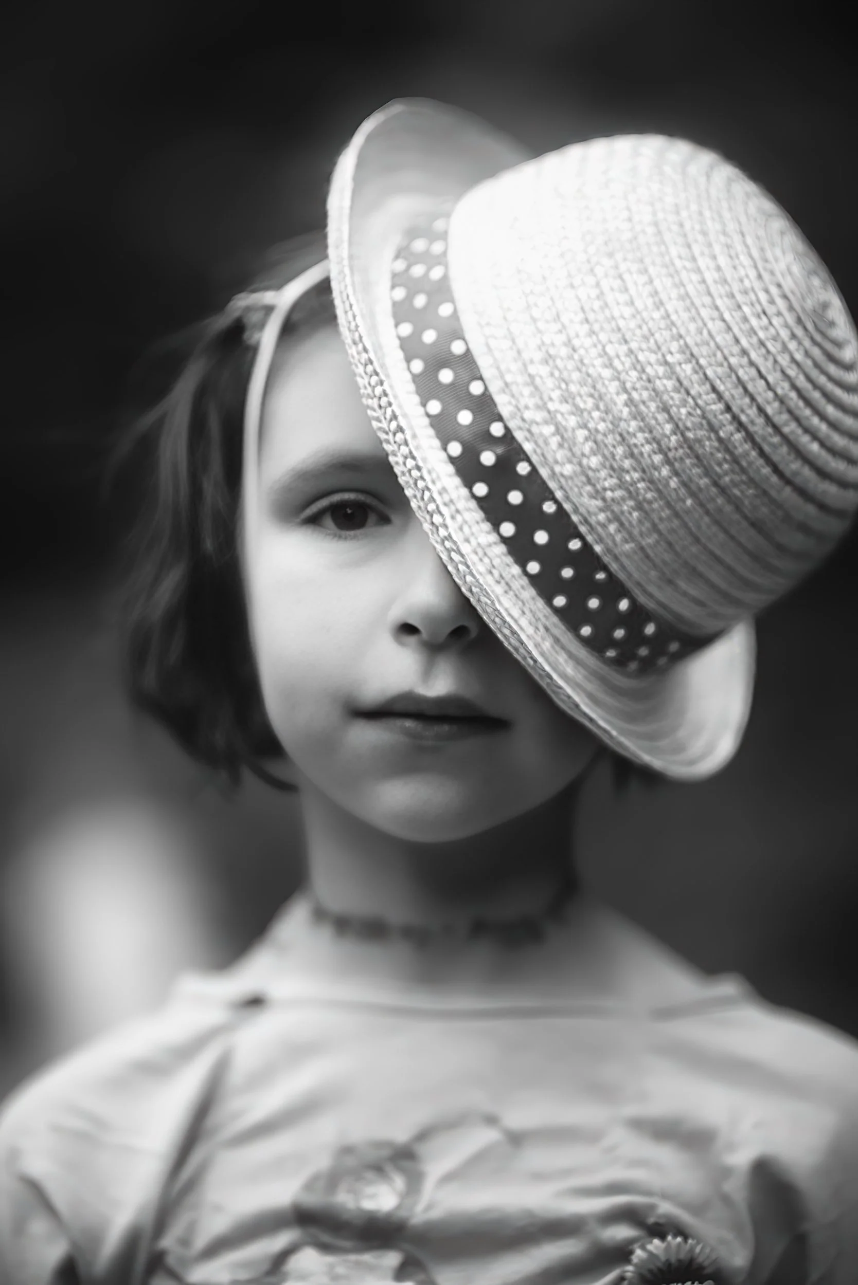 child-portrait-girl-hat-black-white-minimal.jpg