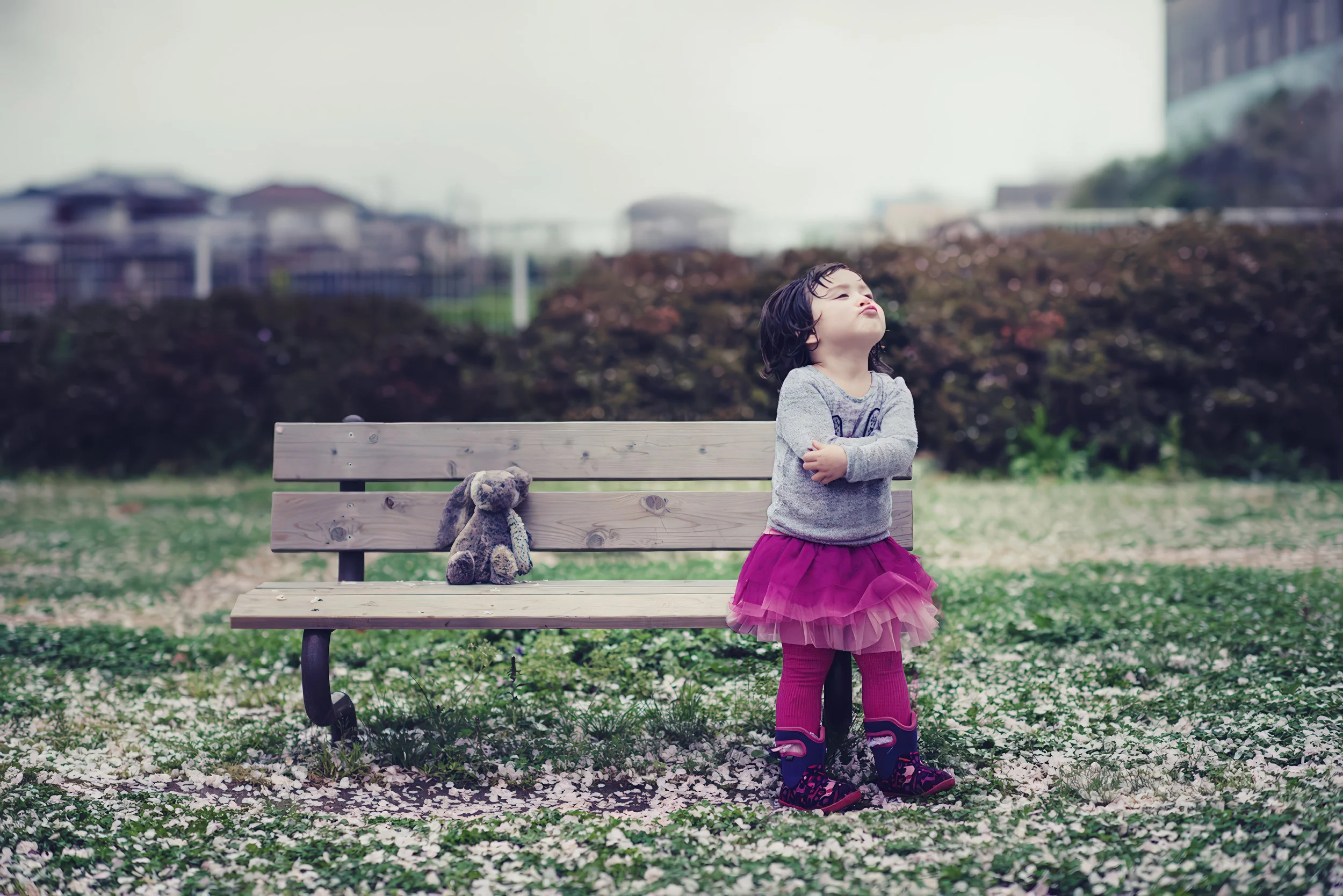 child-alone-bench-teddy-bear-whimsical-outdoor.jpg