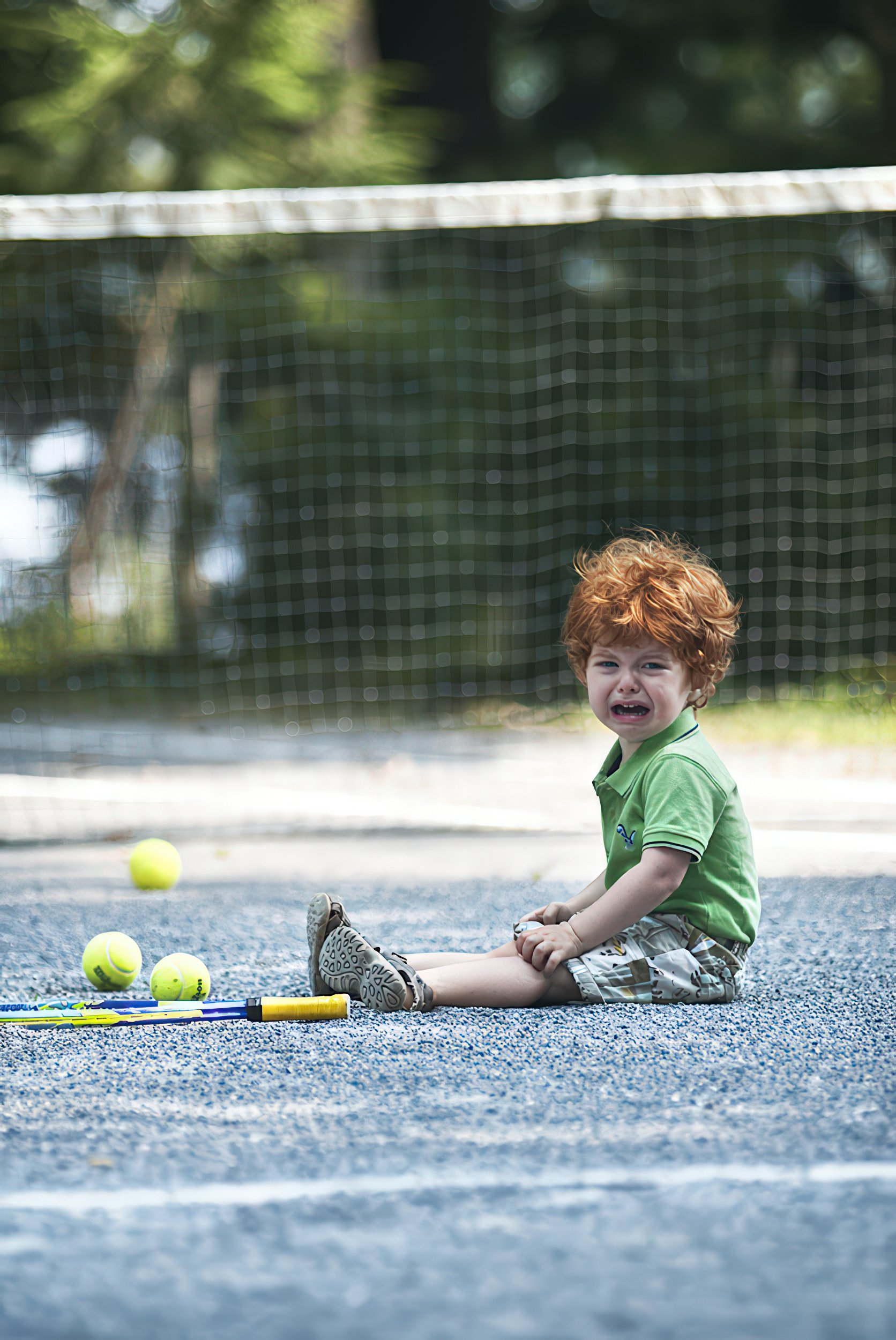 toddler-tennis-court-crying-child-balls-racket.jpg