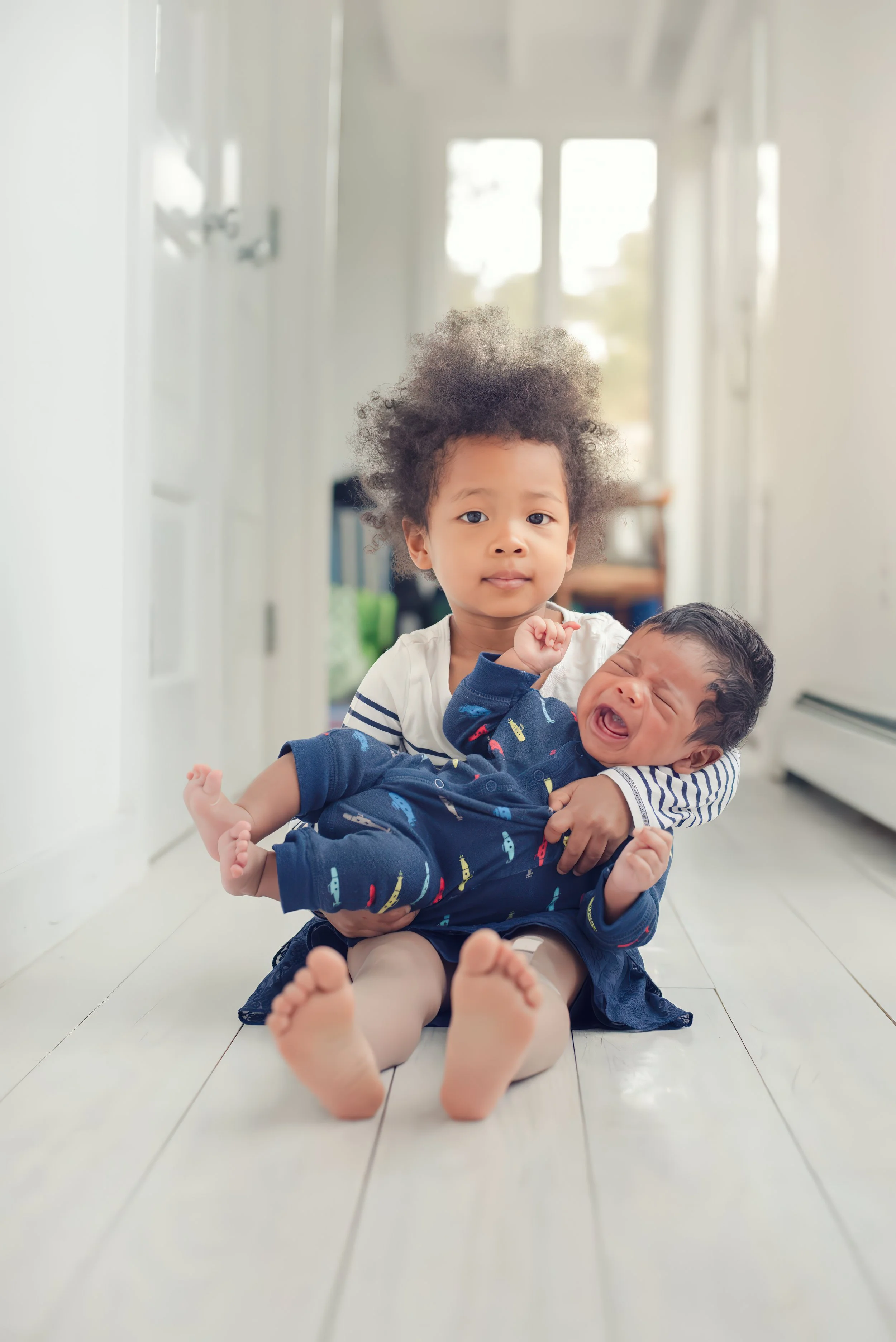 siblinghood-reality-crying-baby-jamaican-documentary-family-photography.jpg