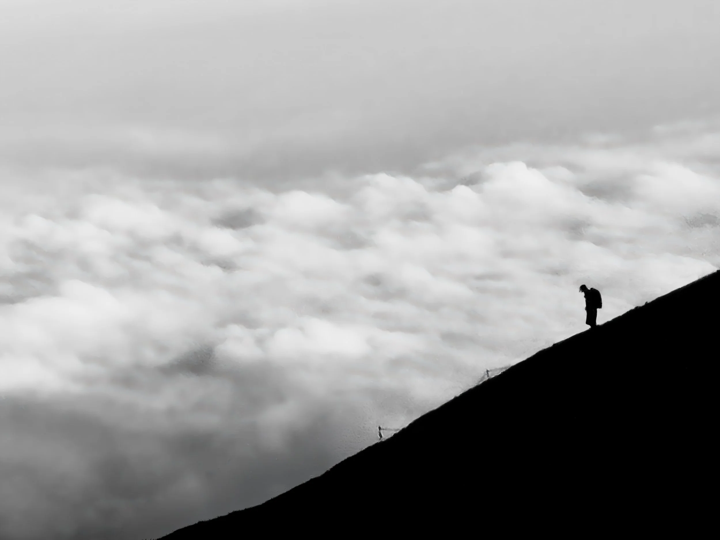 mount-fuji-climbing-silhouette-above-clouds-minimalist-landscape-bw.jpg