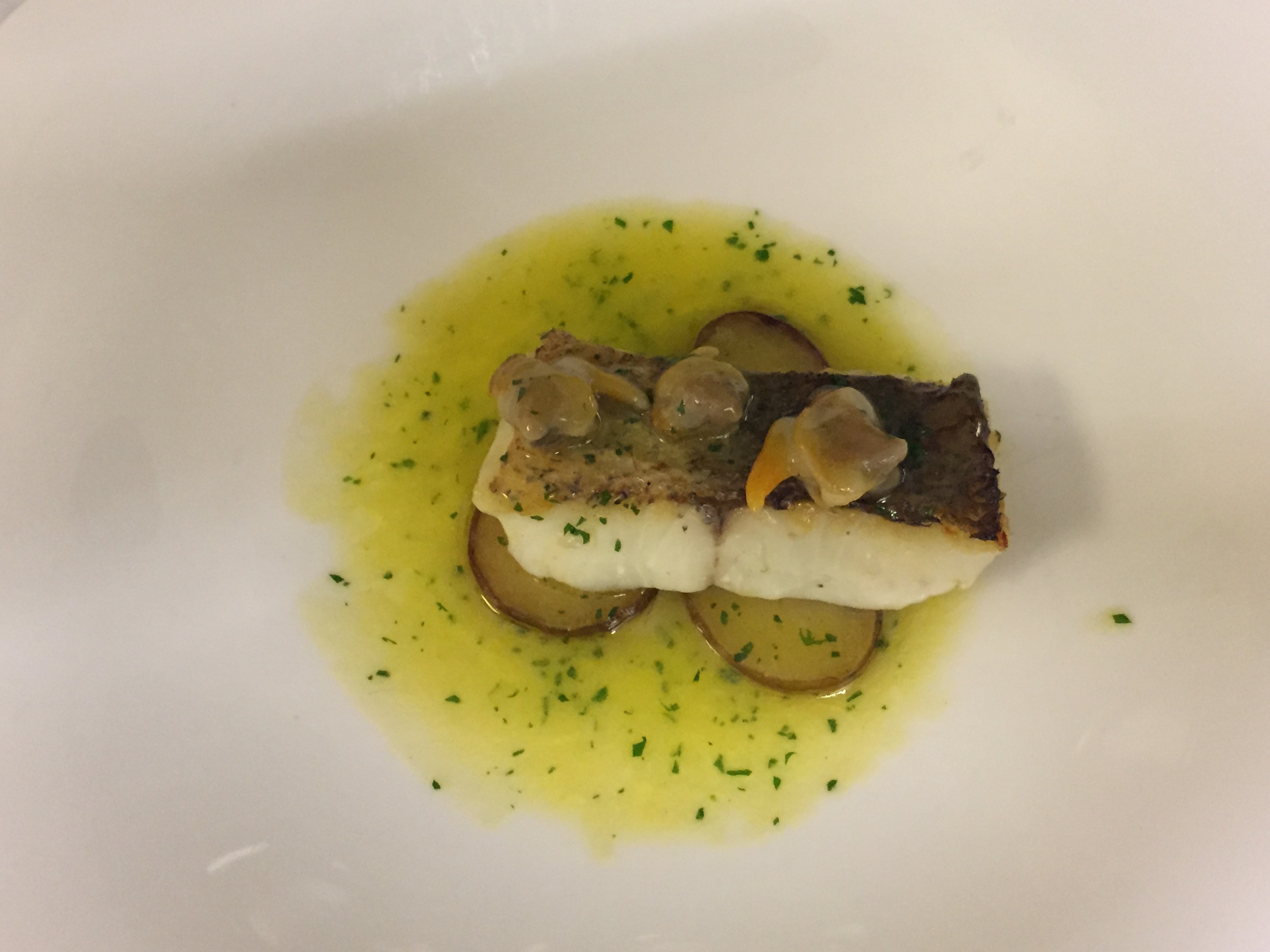 Hake Confit  With Roasted Potatoes and Small Clams