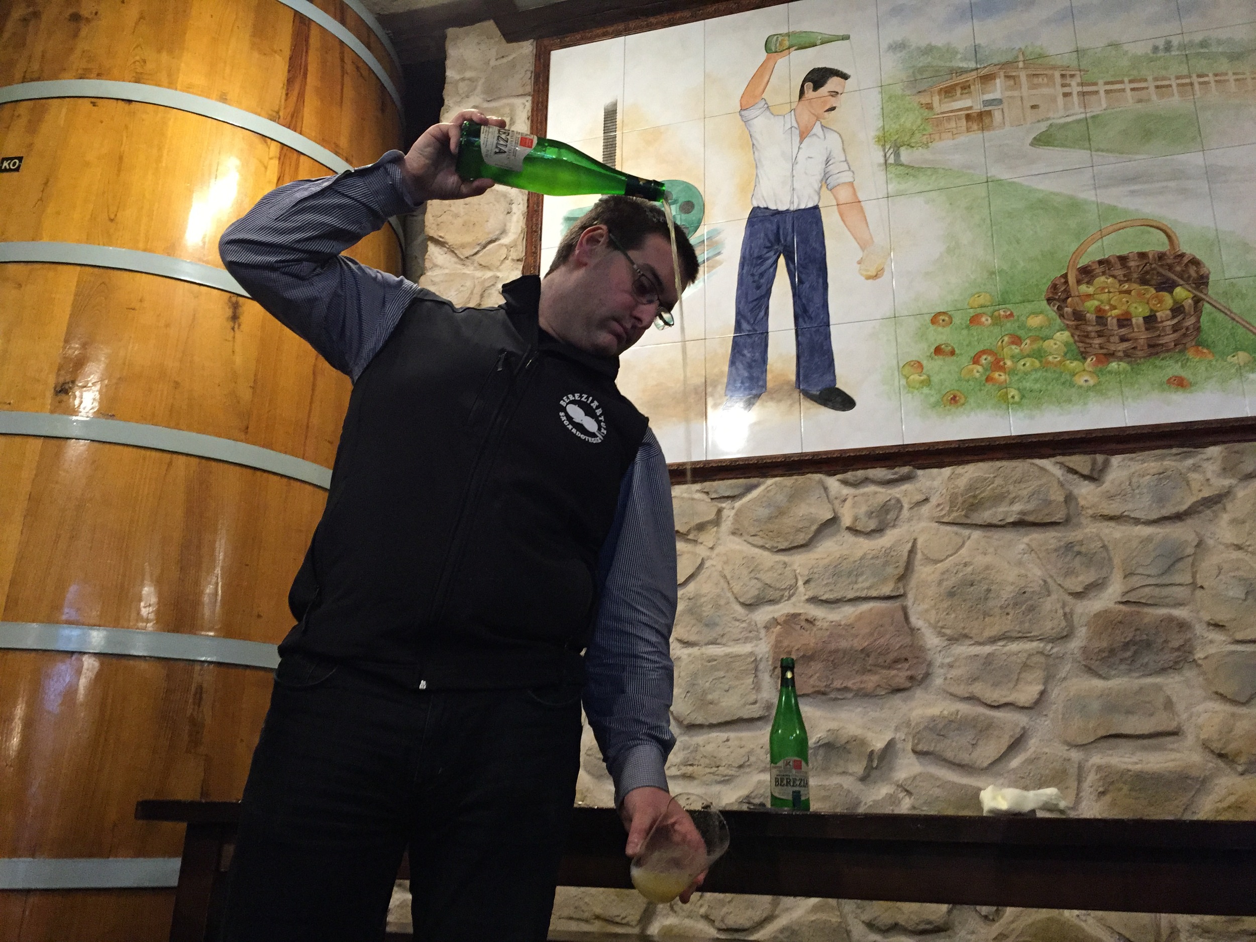 Fourth generation cider maker, Aitor Bereziartua, demonstrates his escanciar technique.