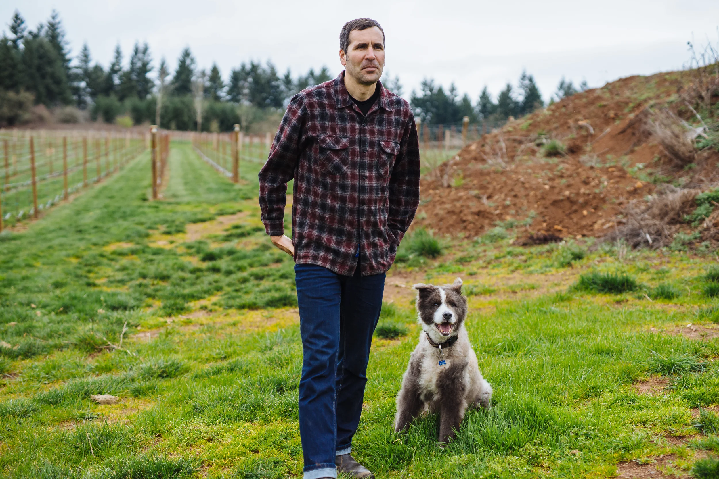 GC John & dog in vineyard.JPG