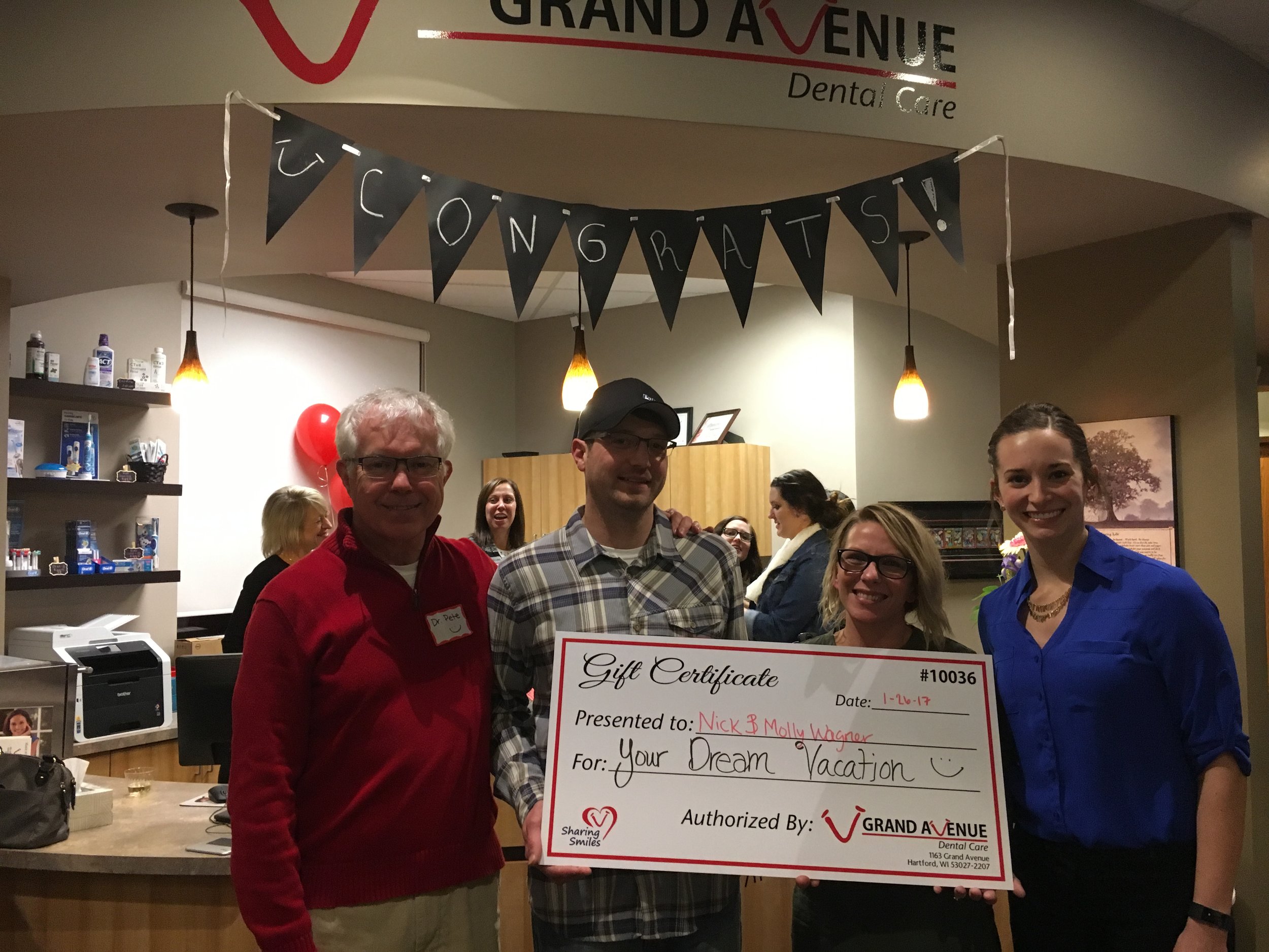 Dr. Wilk, Nick Wagner, Molly Wagner and Dr. Dowden! Congrats to the Dream Vacation winners!