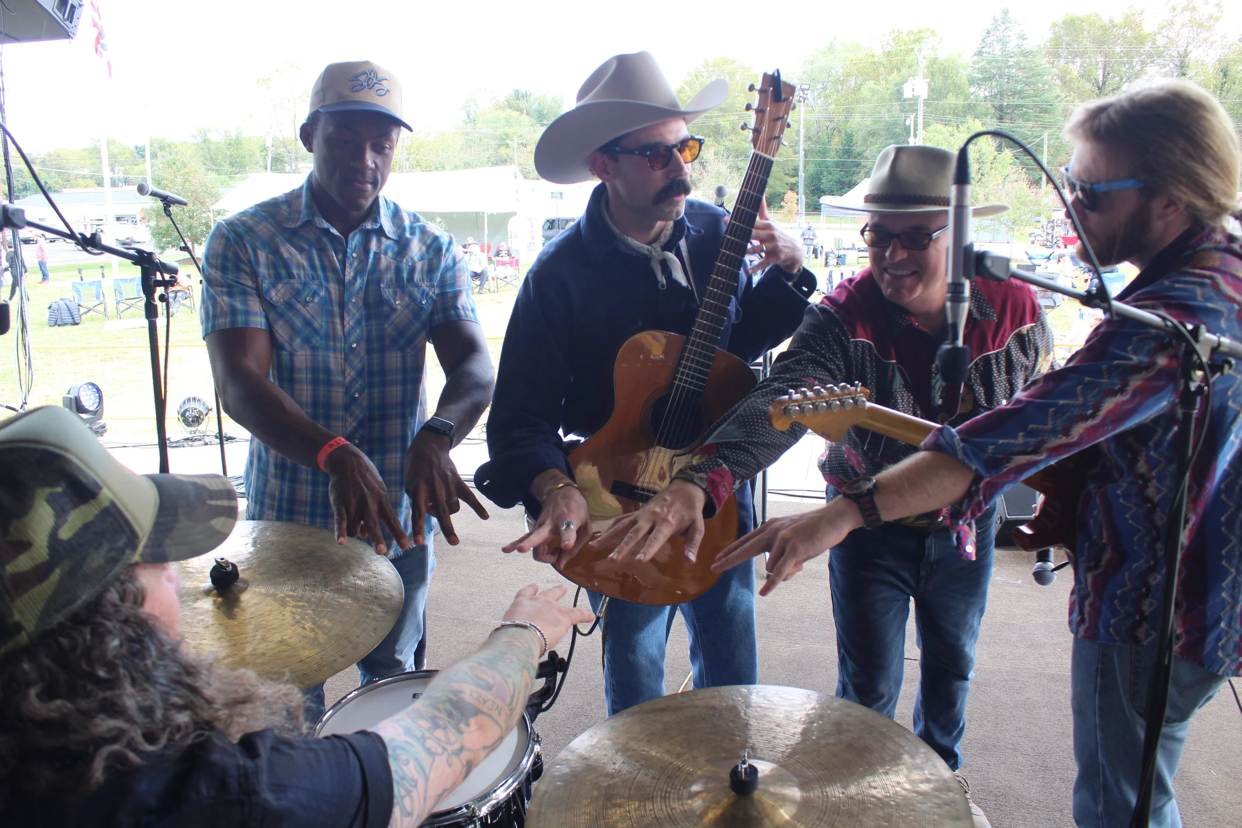 Sam Tayloe leads the huddle for Time Sawyer at Milltown Get Down 2025.JPG