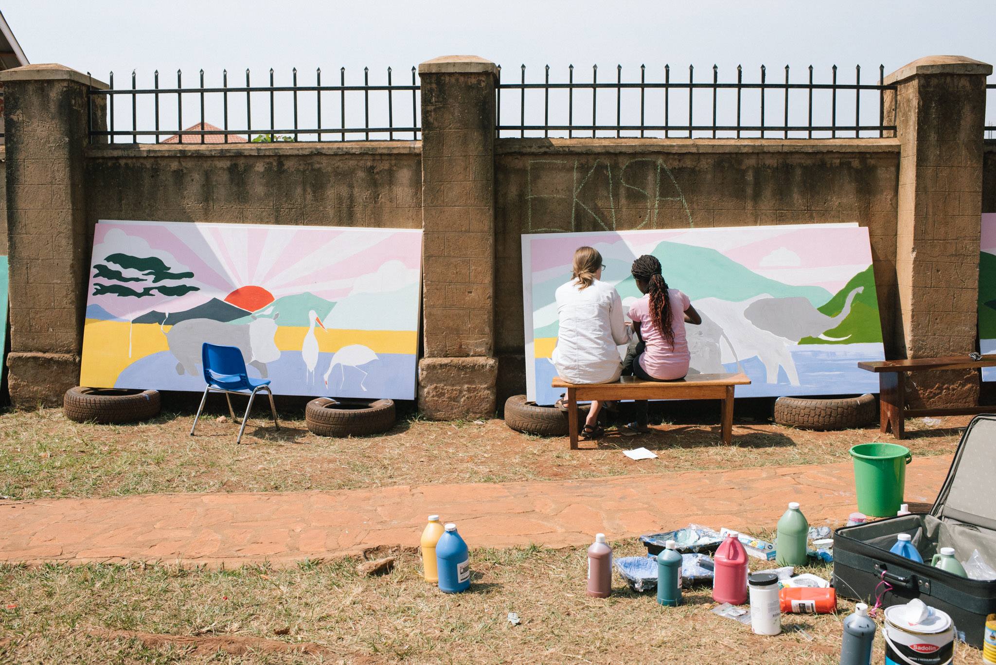 Painting elephants with Blessing. Photo credit Ekisa Ministries