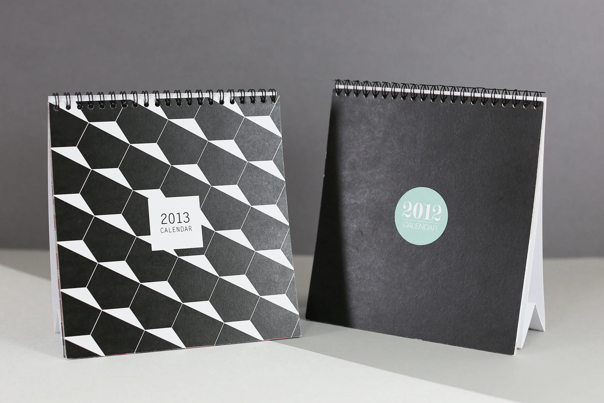 The 2012 and 2013 calendar cover designs