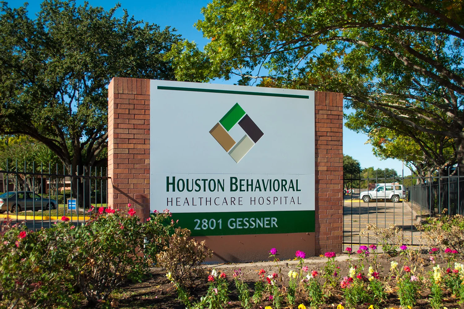 Traditional Red Brick Monument Sign for a Healthcare Hospital - Lighted Aluminum Cabinet and Routed Copy Backed with Translucent Acrylic