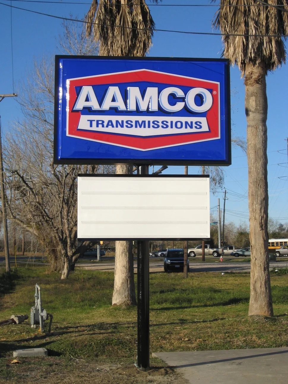 Illuminated Pole Sign with Custom Embossed-Pan Faced Cabinet and Marquee Zip Track