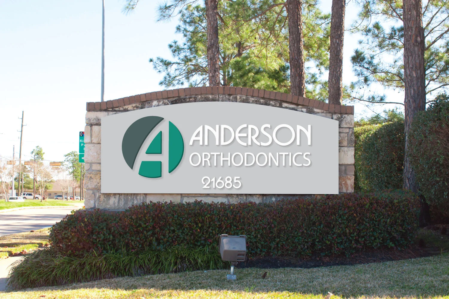 Custom Designed Aluminum & Brick Monument Sign to Match Company Logo and Theme Colors in Raised Acrylic Letters