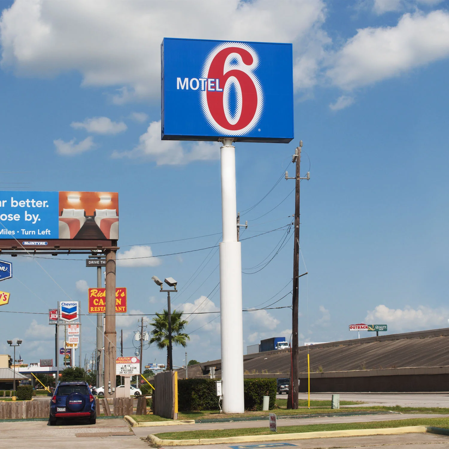 Lighted Pole Sign for Motel 6 with a Permanent Flex Face