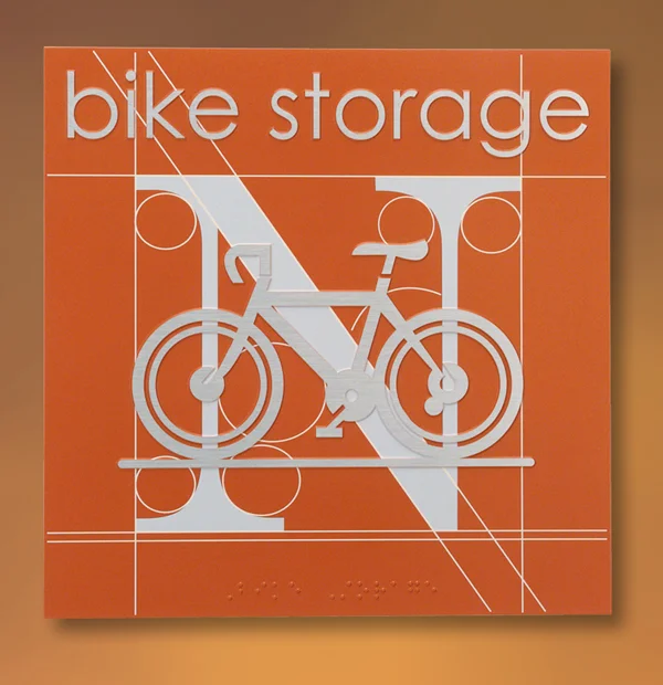 Emphasize the direction of North with a DecorFinish symbol on a Zinc ADA Metal Sign with raised text and design elements