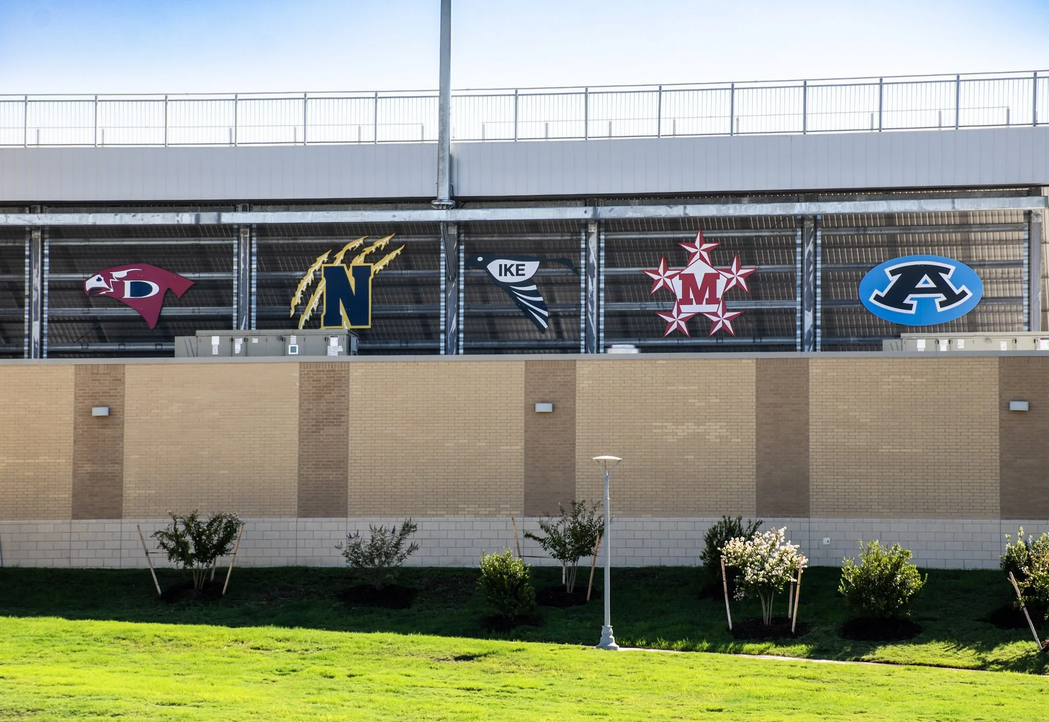 Digitally printed ACM mascot logo signage installed along the exterior of W.W. Thorne Stadium for Aldine ISD in Aldine, Texas.