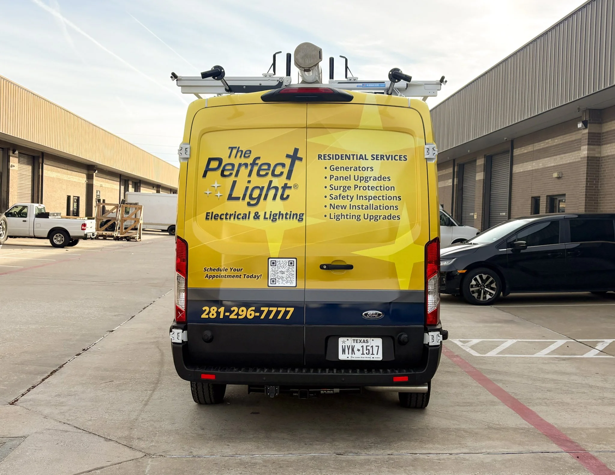 Houston residential electrical van wrap showing lighting services and contact info.