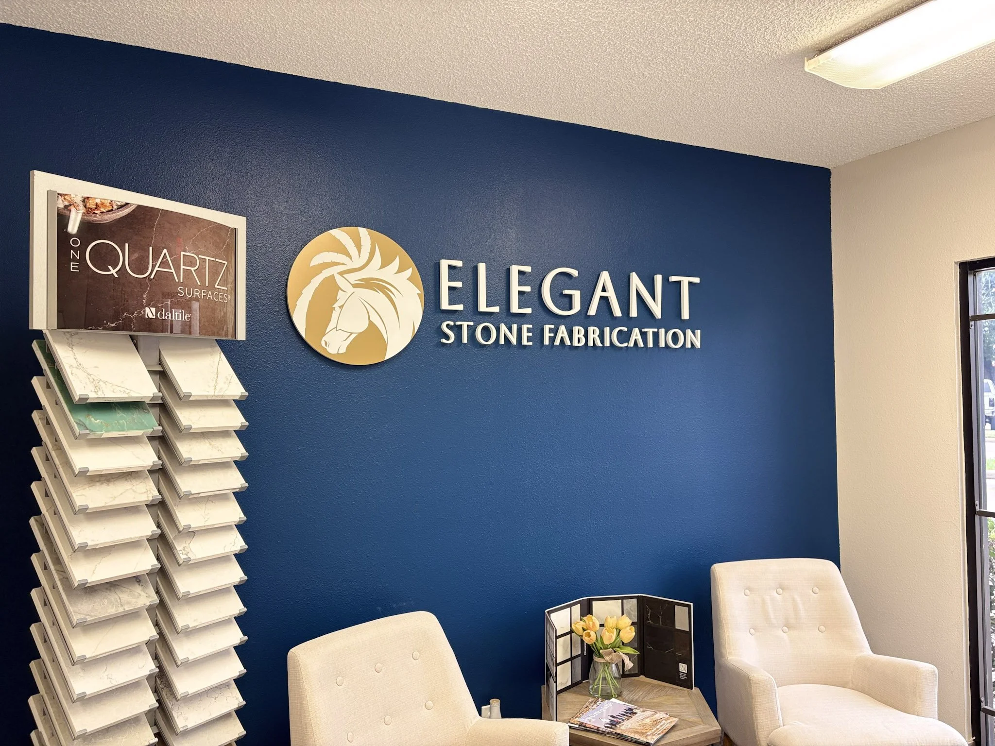 Dimensional acrylic lobby sign with raised business logo and lettering, fabricated and installed by Saifee Signs for a professional office in Houston.
