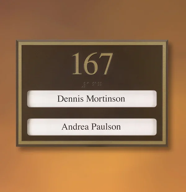 Metal ADA office sign in Houston with room number 167 and interchangeable name plates for staff, raised tactile text and braille.