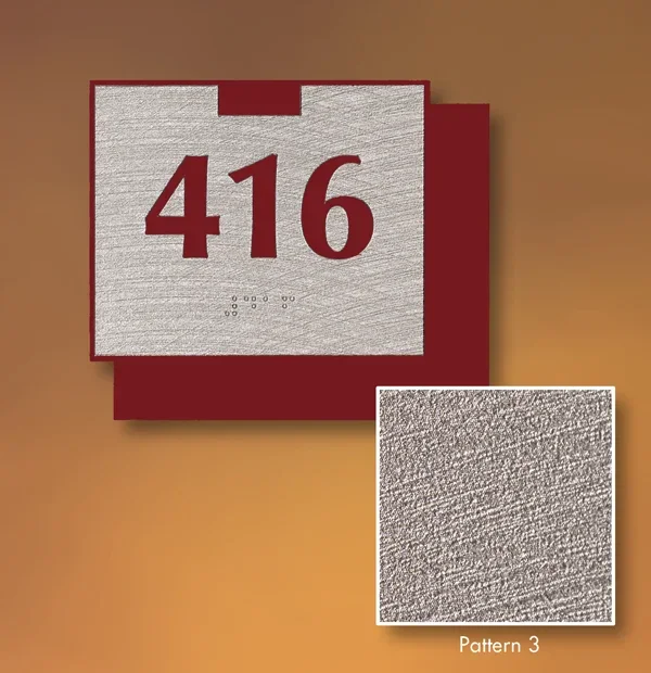 3D textured ADA room sign displaying number 416 with layered red backing and brushed metallic surface, custom tactile signage in Houston.