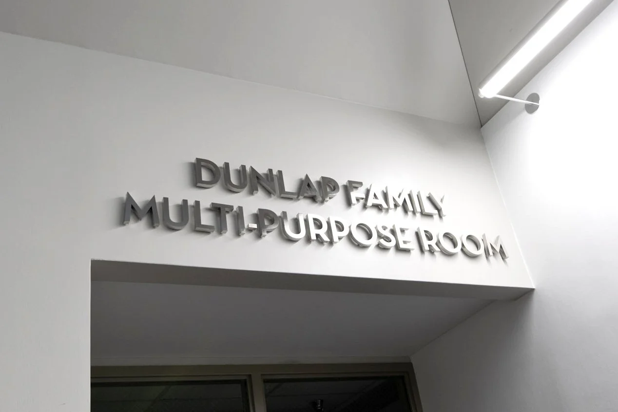 Interior dimensional lettering signage for the Dunlap Family Multipurpose Room at The John Cooper School.