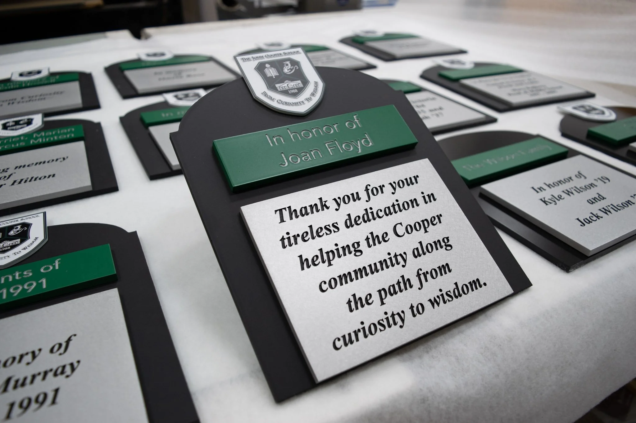 Custom donor appreciation plaque with engraved text and raised details created for The John Cooper School recognition wall.
