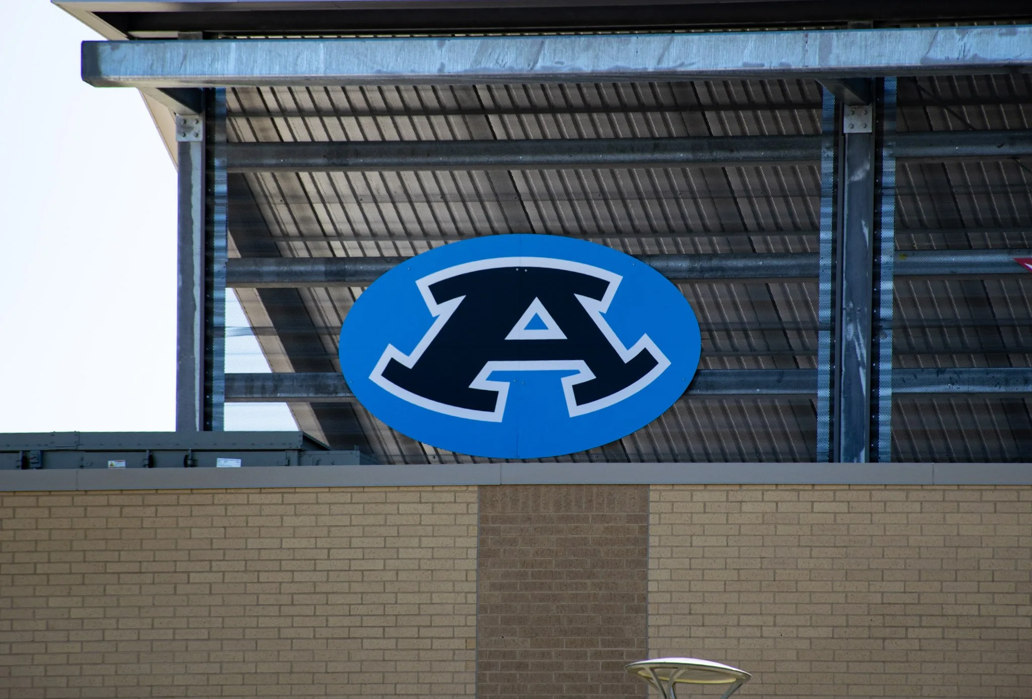 Digitally printed ACM Aldine ISD "A" logo signage installed at W.W. Thorne Stadium in Aldine, Texas.