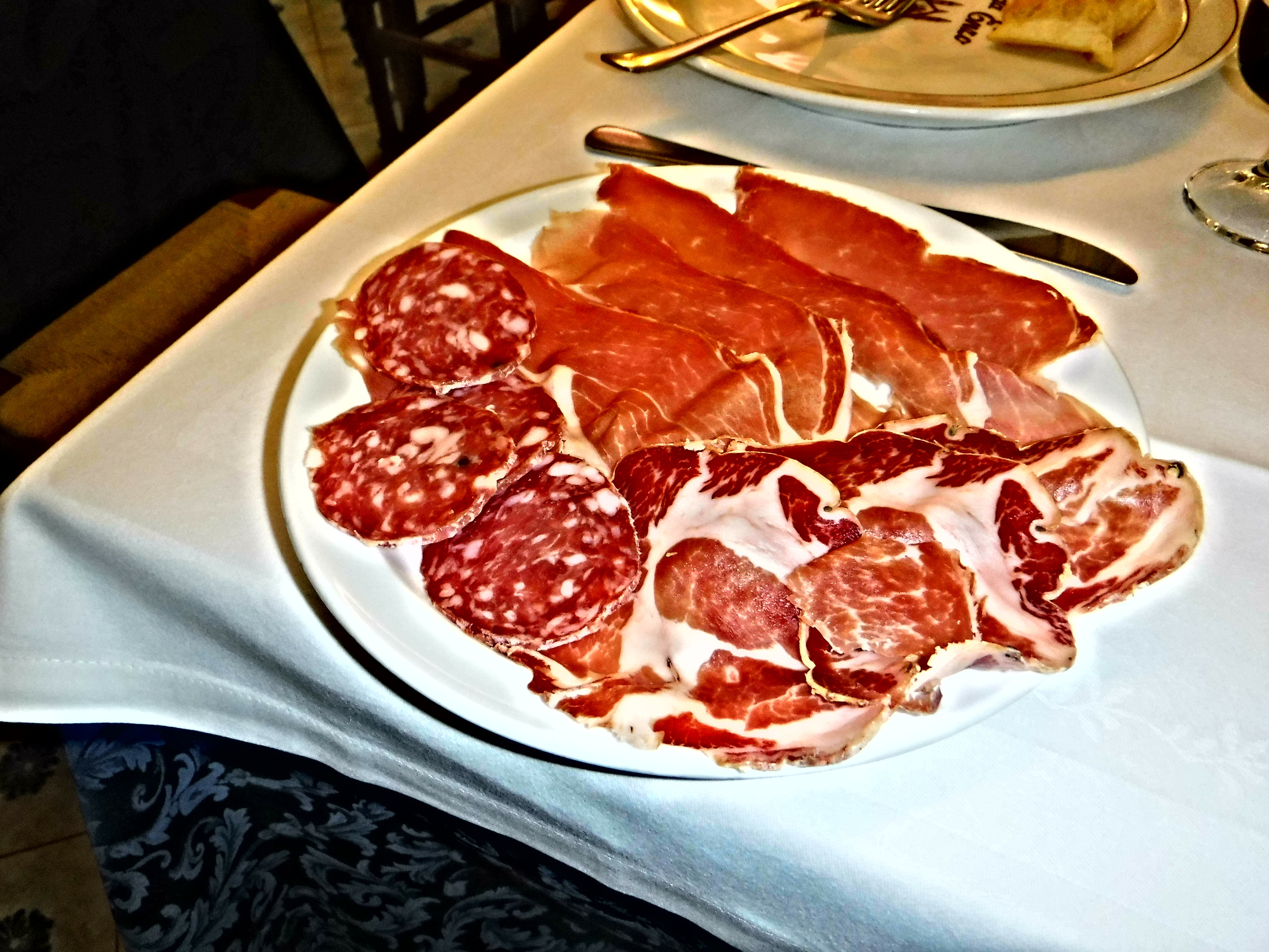 5. Lunch begins with an appetizing array of salumi -local cured meats (1).JPG