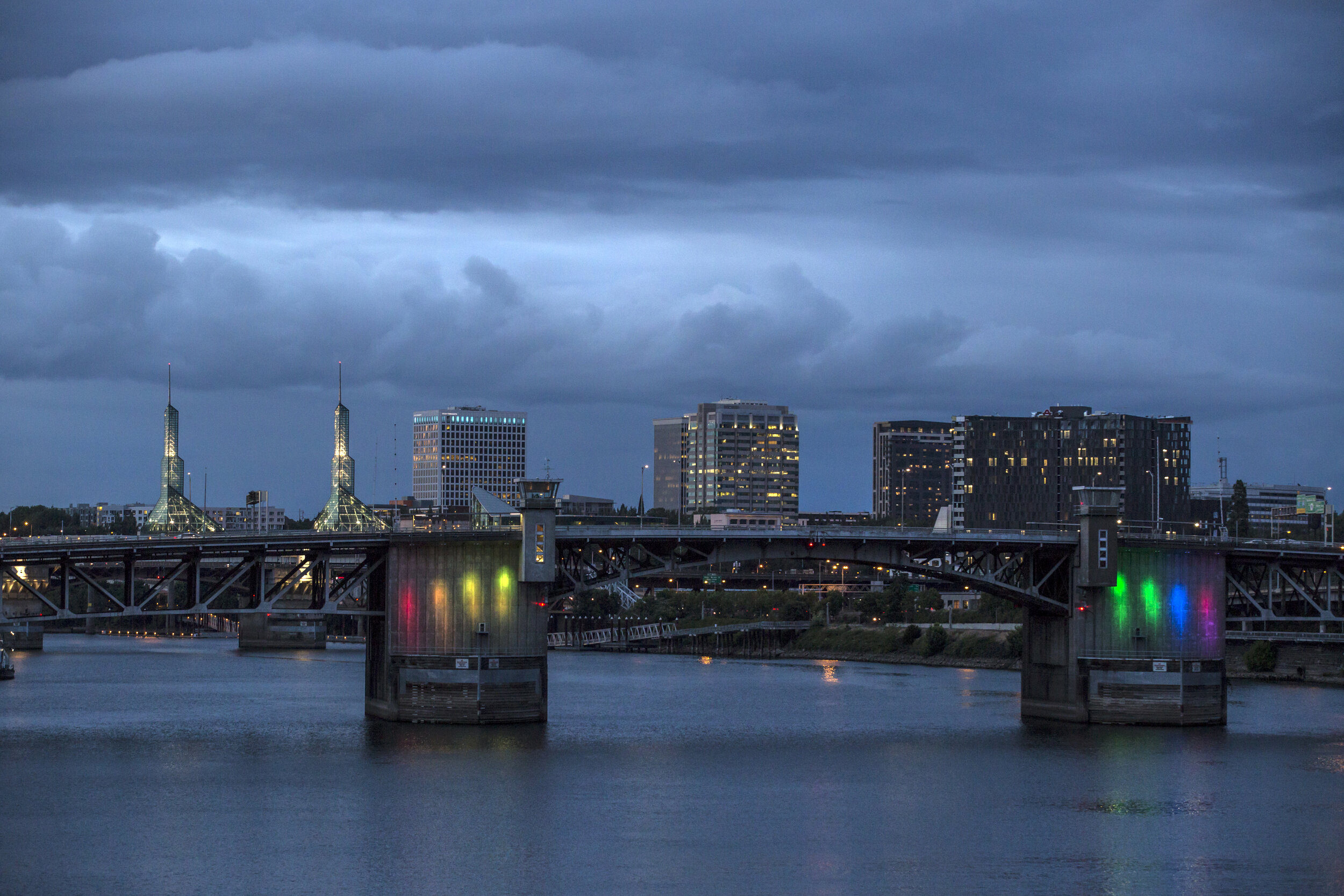 The Morrison Bridge lights up in rainbow colors Monday evening to honor the victims of the Orlando Shooting, where 50 people were killed and another 53 were injured at Pulse Nightclub.