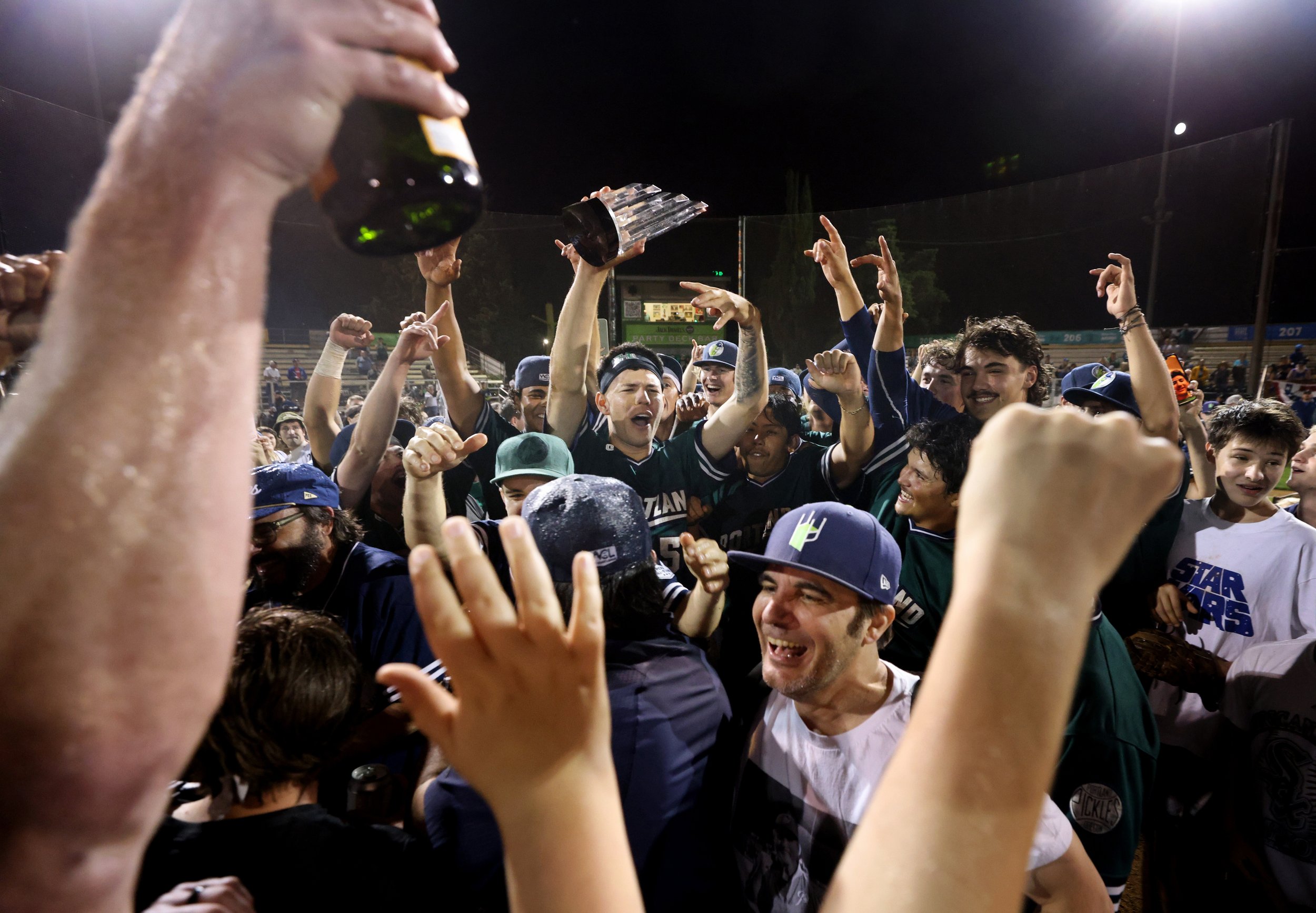 The Portland Pickles celebrate after defeating the Wenatchee Applesox 6-5 to win their first West Coast League Championship.