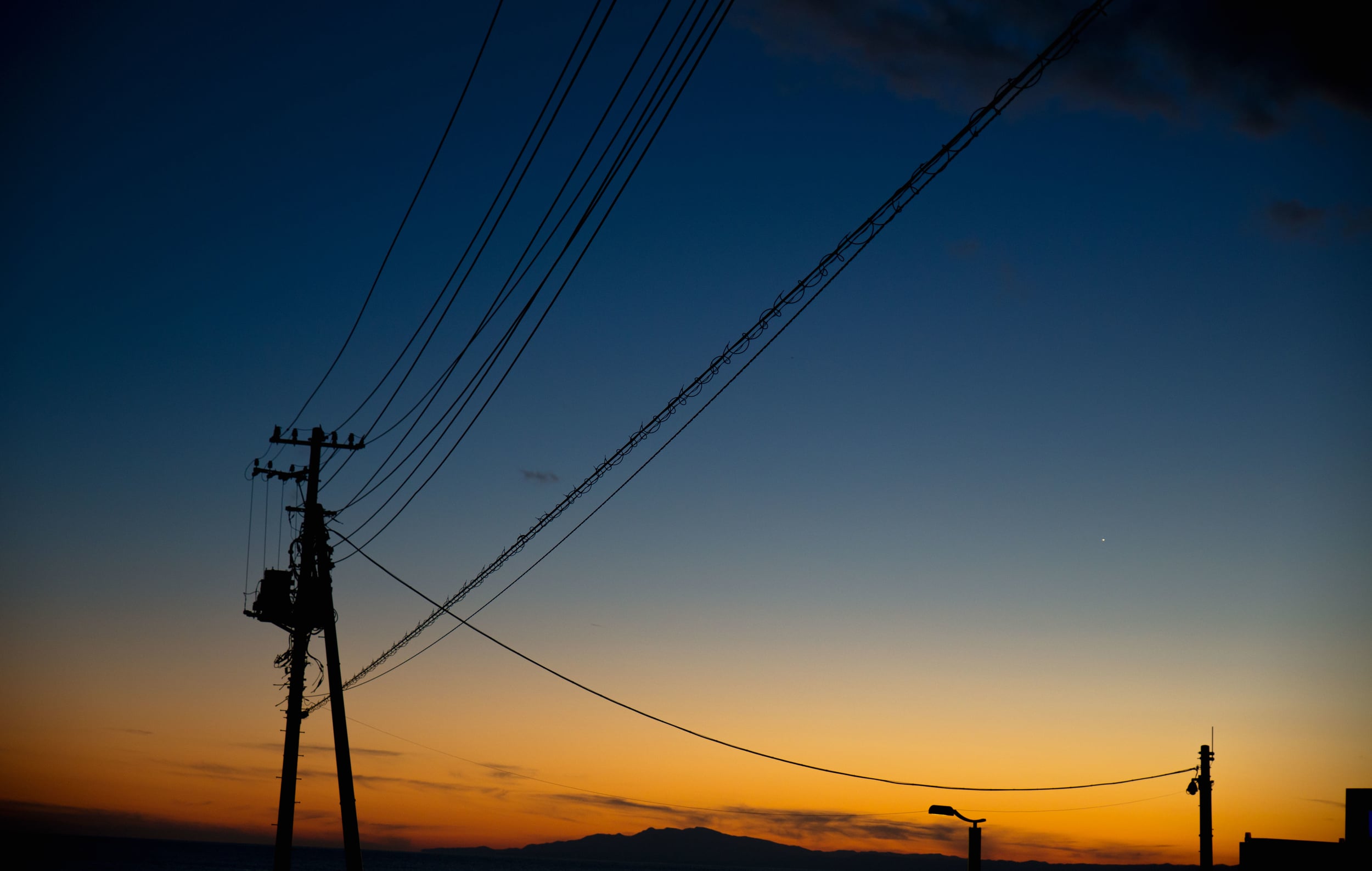 Dawn skies and power lines