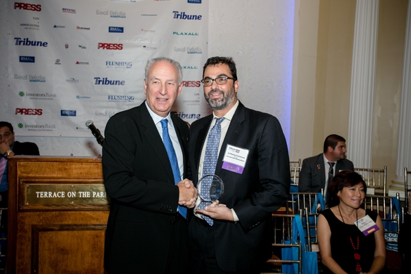 Skyline Risk Management Partner: Anthony Kammas receiving his award from the Queens Tribune 2016 Real Estate Market Place Awards.