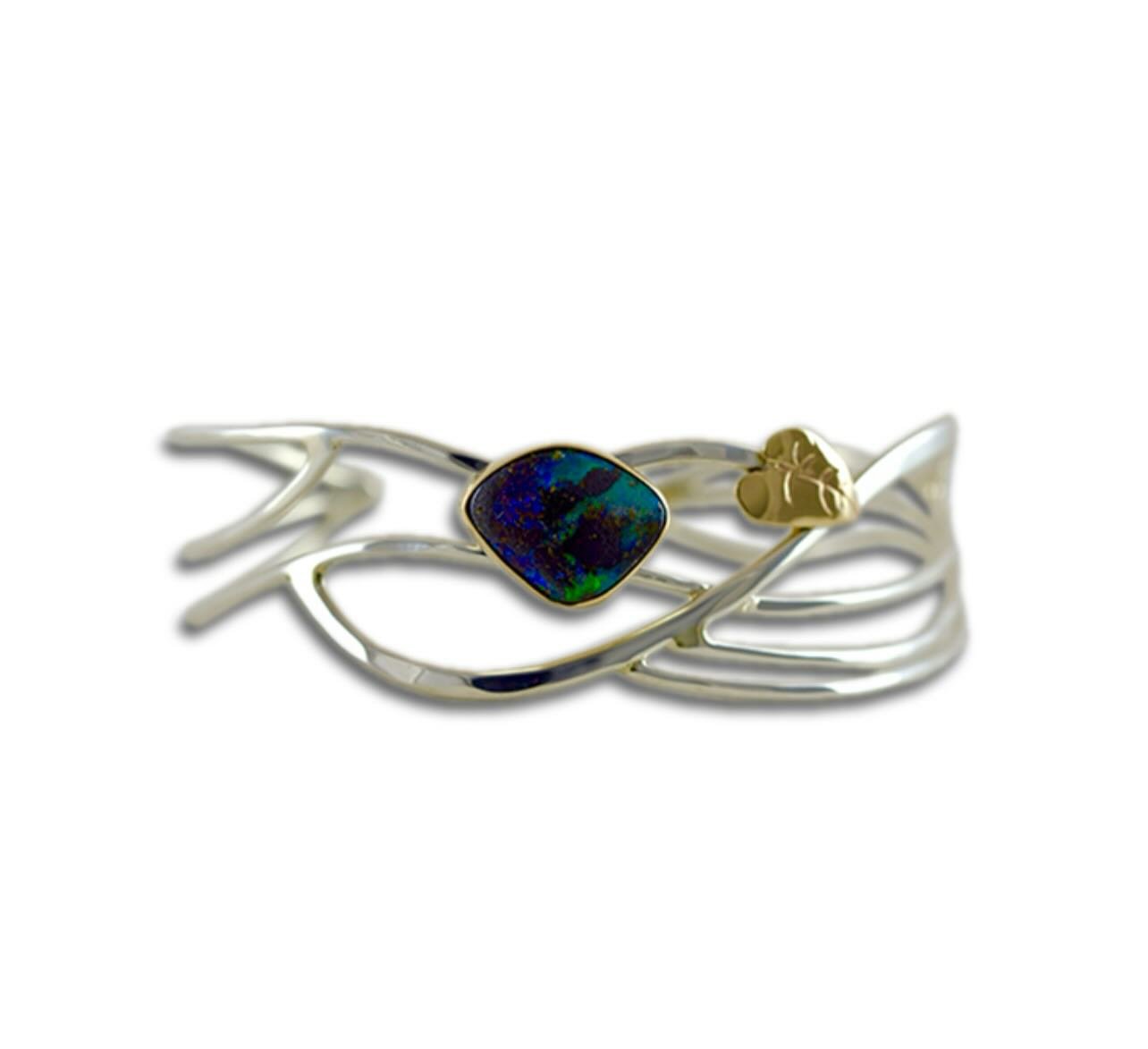 Sterling Silver Bracelet with Boulder Opal and 14k Gold Accent Leaf

This mixed-metal bracelet is on trend, sturdy, and comfortable for summer. One of a kind!

$385.00
 
To order, go to courtneydesign.com (link in bio)