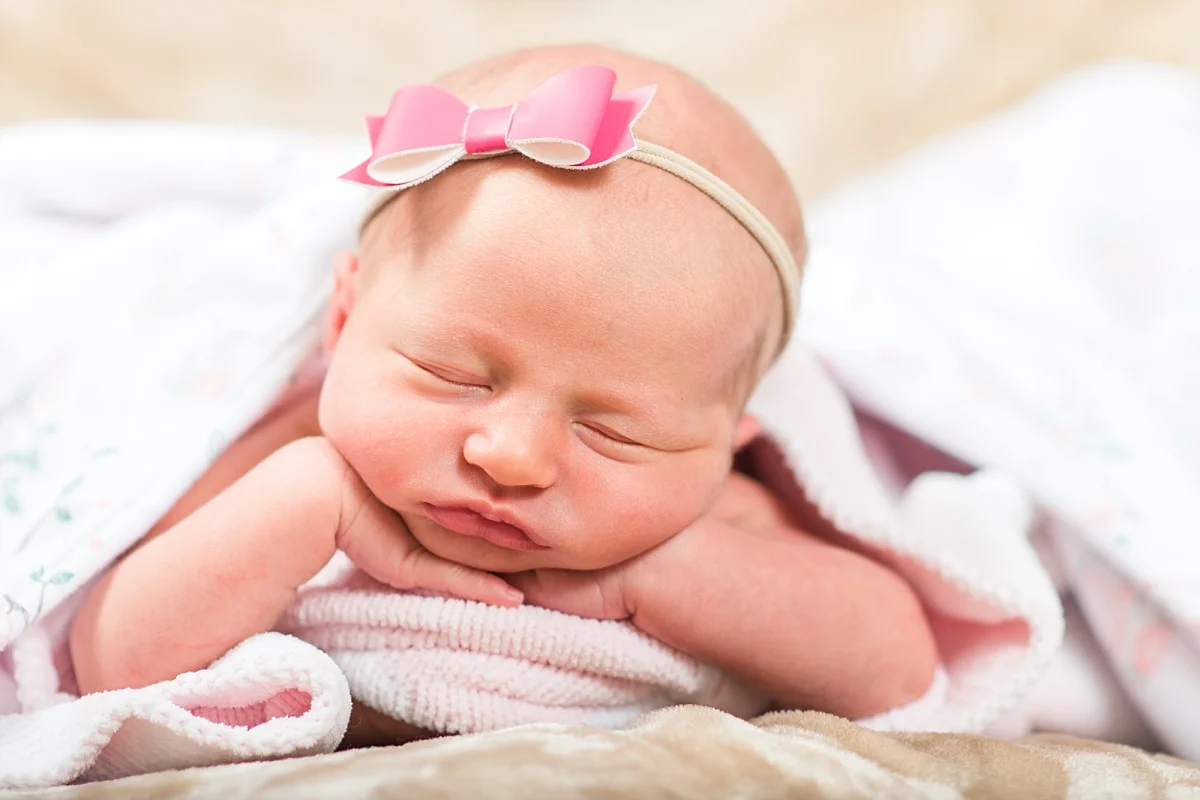 Ok ya'll, I have to admit I was so excited to capture this shot that I had a hard time keeping the camera still! ADORABLE!!!!!!!!!!!! (Ok, and a little secret...Momma Allie was holding her up a bit underneath the blanket... SHHH!!!)