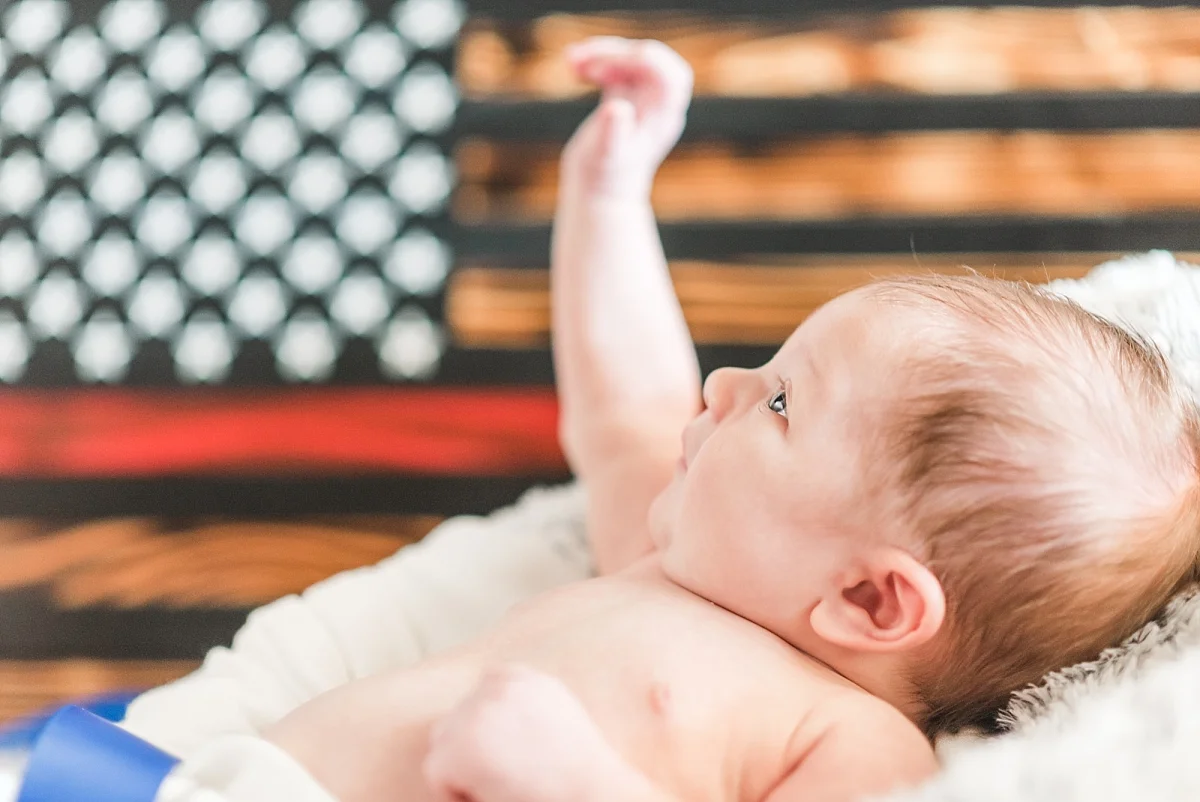 “I’m proud to be an American! Where at least I know I’m free…”