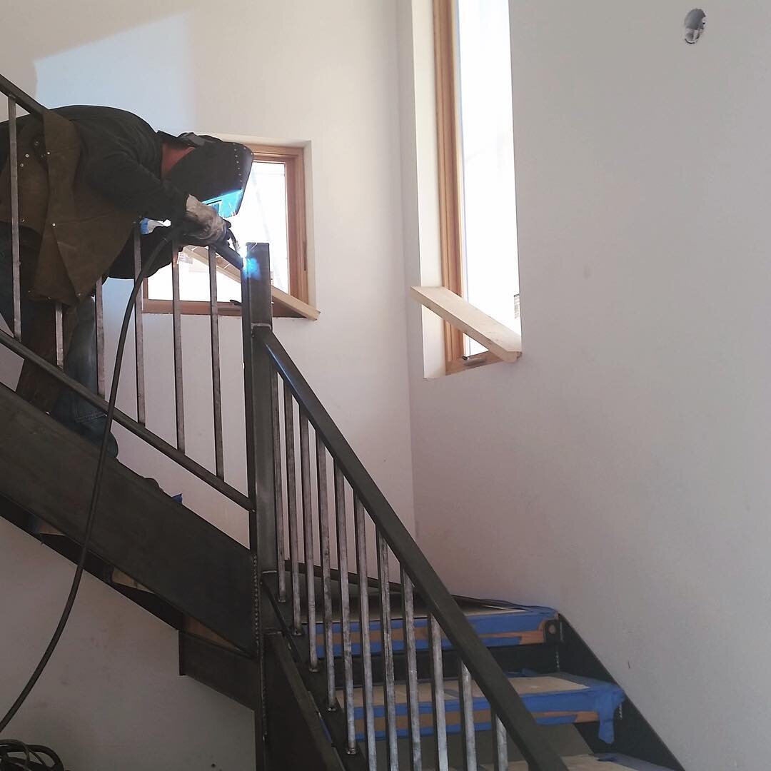 Welding up some #steel and #timber goodness at a house outside of #durangocolorado that's about to finish up.