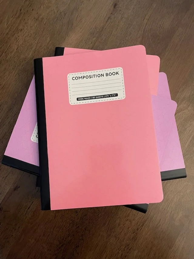 pink and purple notebooks