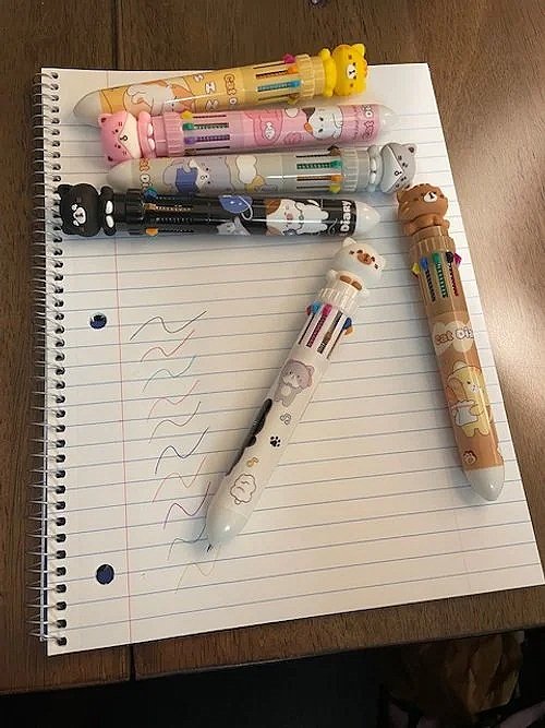 cat-topped ballpoint pens
