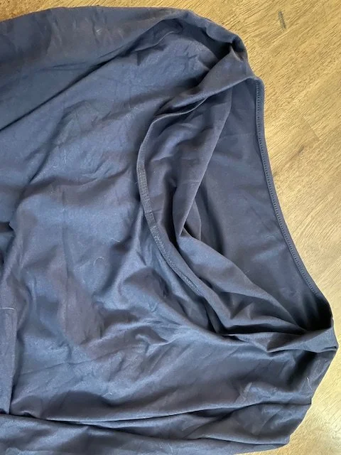 long-sleeve navy shirt