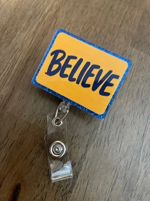 believe badge reel