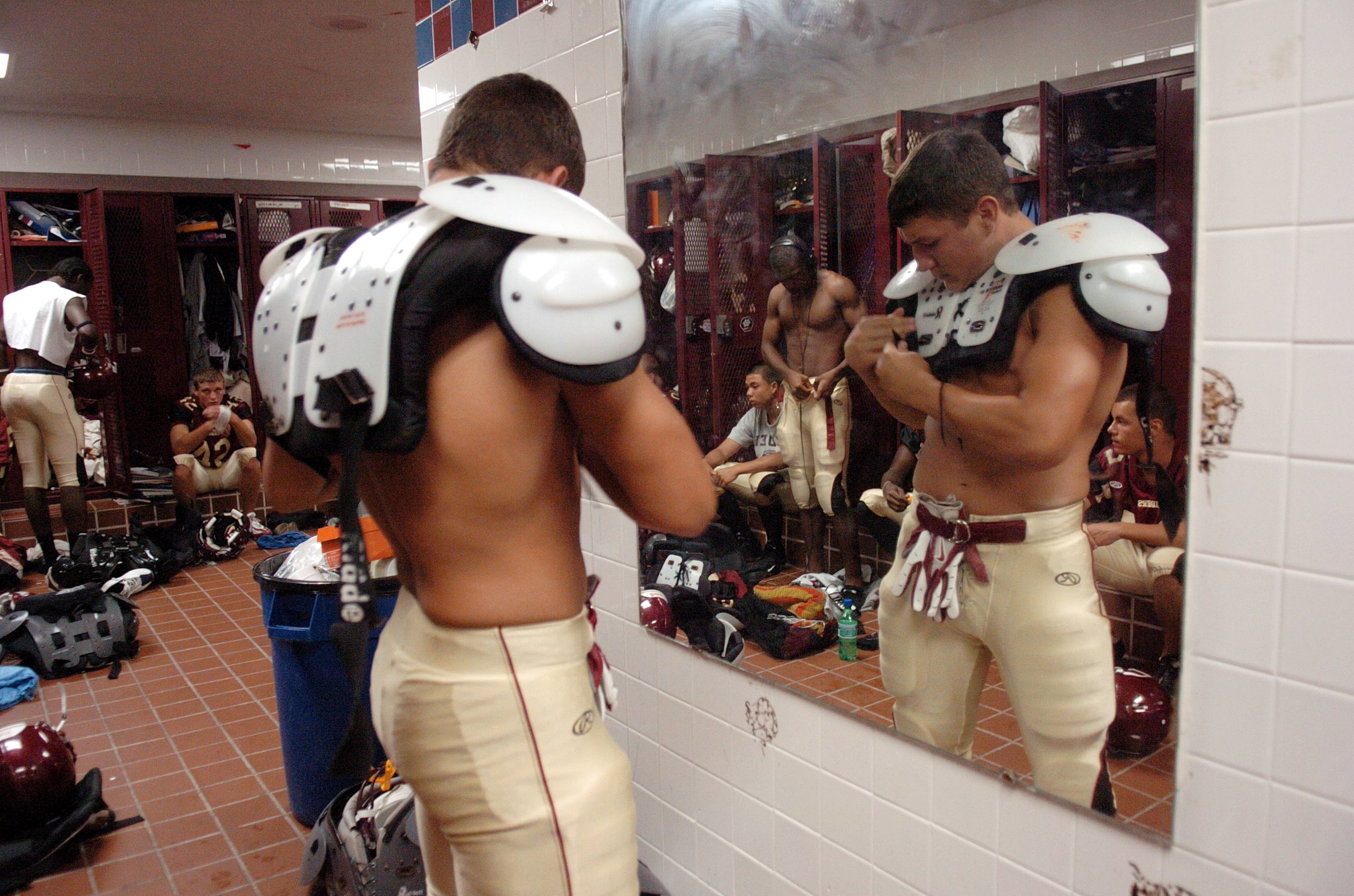 Kevin Sanchez and his teammates prepare for Riverdale's homecoming game.