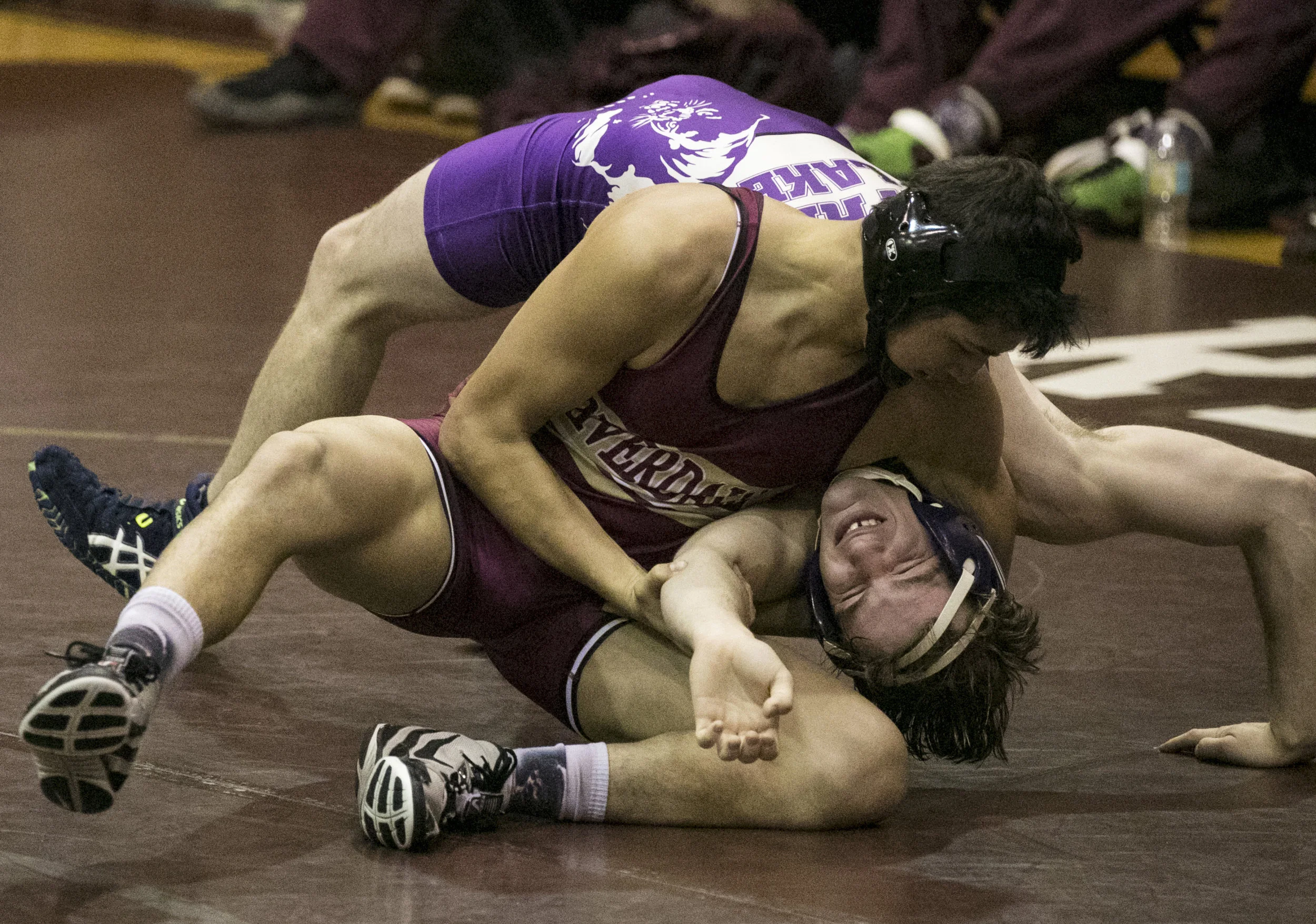  Riverdale’s Jesse Martinez wrestles Charlie Minshall in the 160 weight class during the Class 2A wrestling duals regional tournament at Riverdale High School on Thursday, January 11, 2018. The first two matches were Palmetto Ridge vs. North Fort Mye