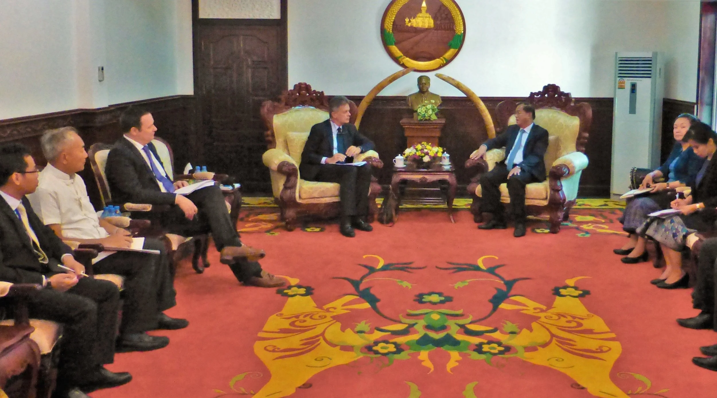 Jean-Paul Gauthier and Ambasador Michael Grau (German Embassy to Lao PDR) meet with Governor Santiphab Phomvihane, Governor of Savannaketh Province. Locus has helped advise zones policy discussions for the Lao government since 2015.