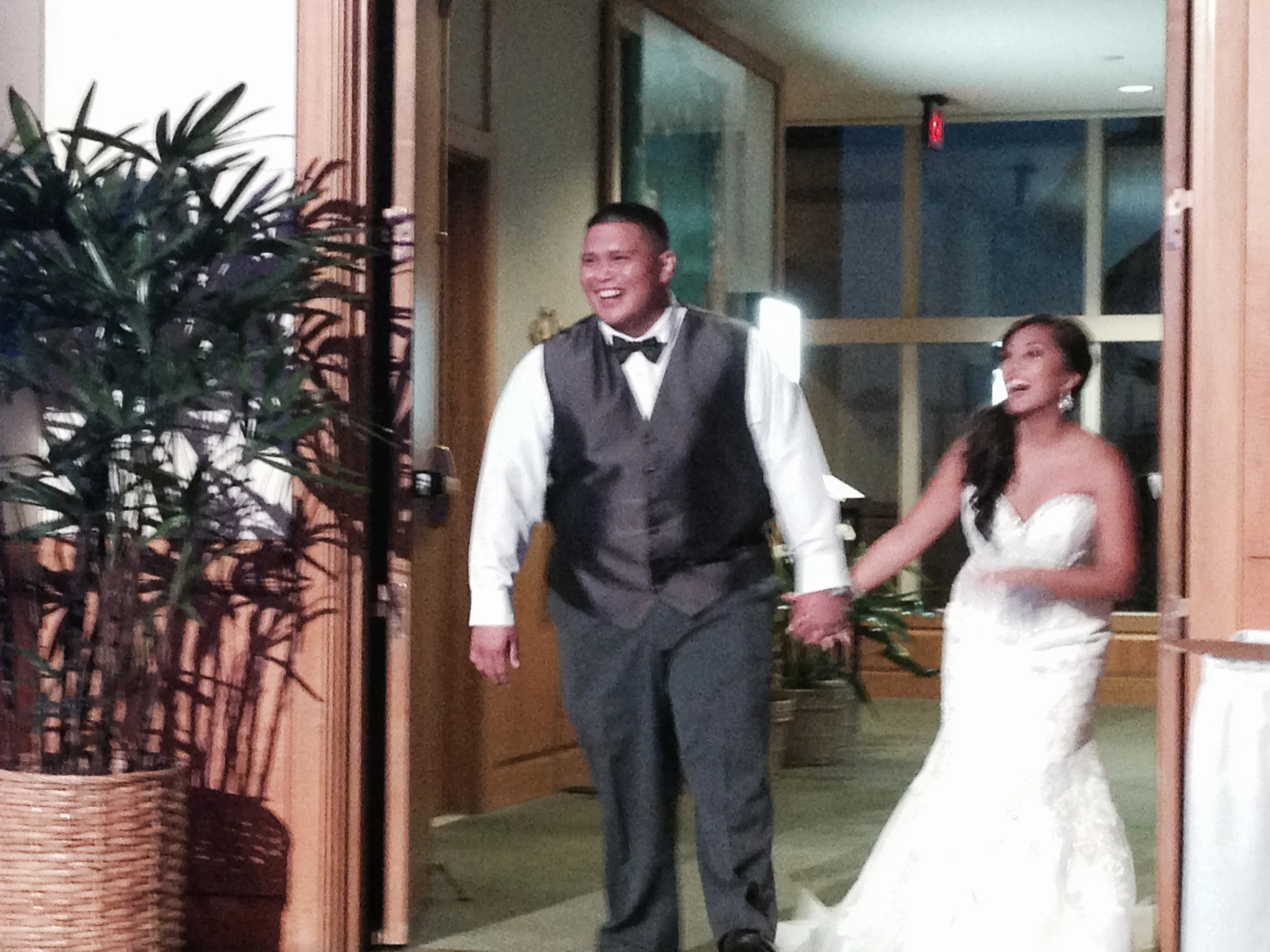 mike-ashley-hawaii-prince-hotel-reception-wedding-entrance