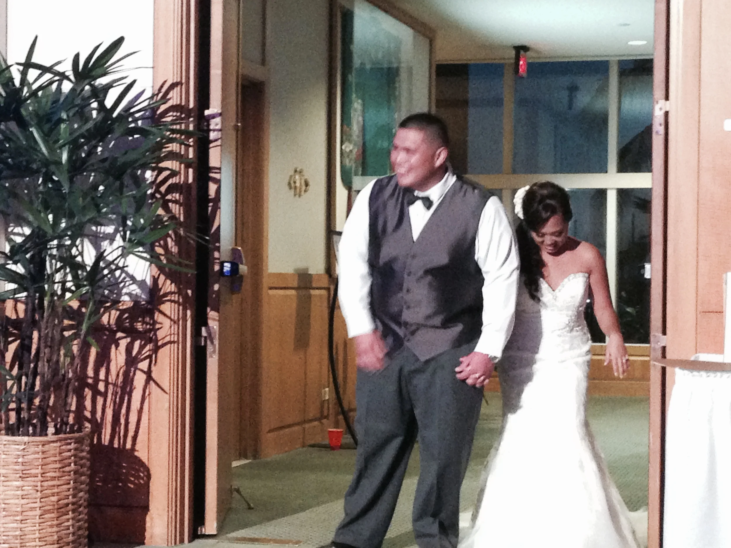 mike-ashley-hawaii-prince-hotel-reception-wedding-entrance