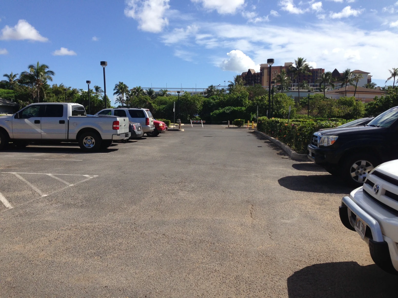 Parking area - about 12 stalls, gets crowded, better to get dropped off if possible. &nbsp;Take Ko'olina exit, Make a right turn by Lanikuhonua Sign, drive to end where you'll see a parking lot on the right. &nbsp;Walk down sidewalk to beach path en…