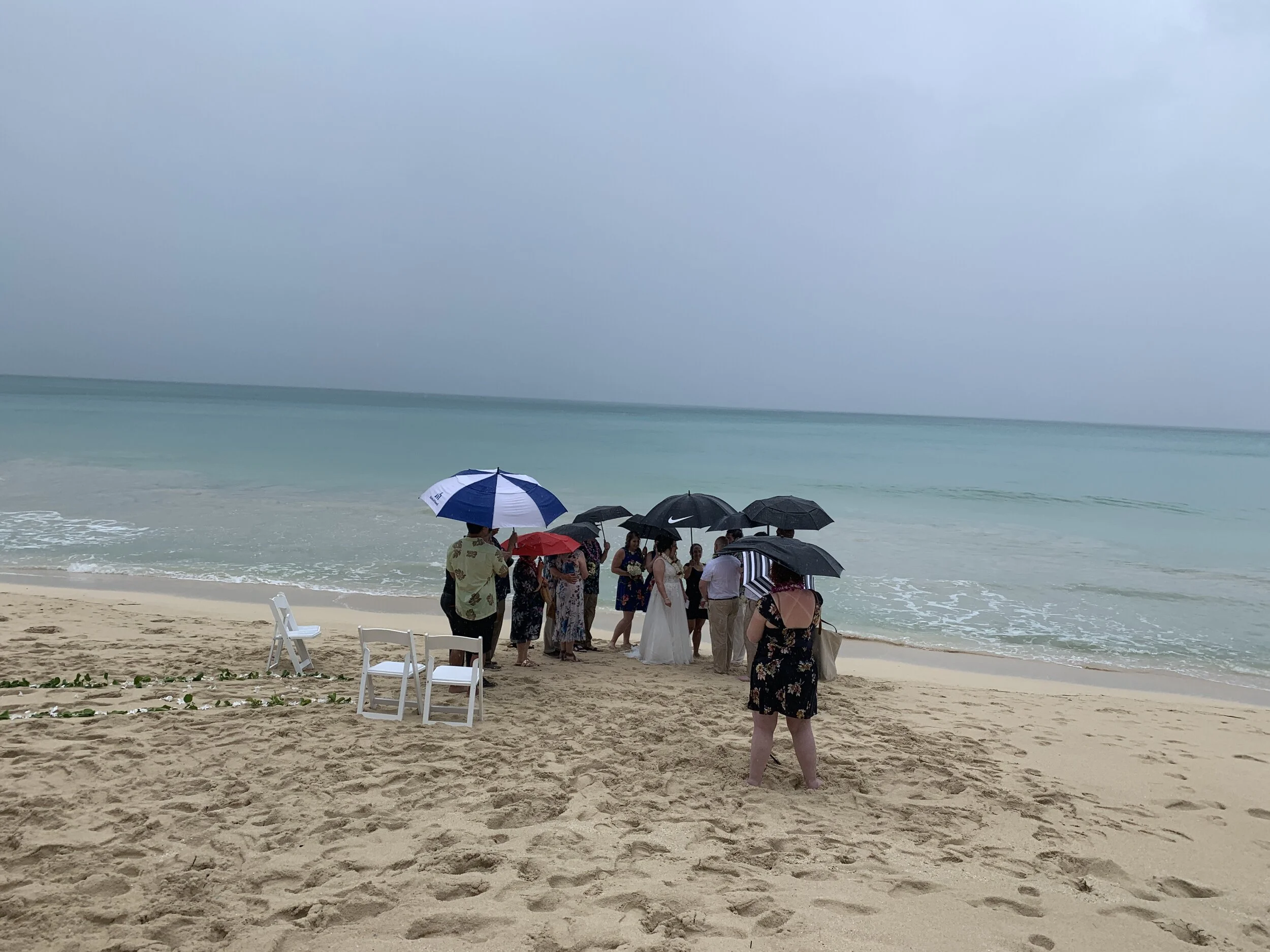 Our rainy wedding day wedding - which ended up being so sweet and intimate. One we definitely will never forget!