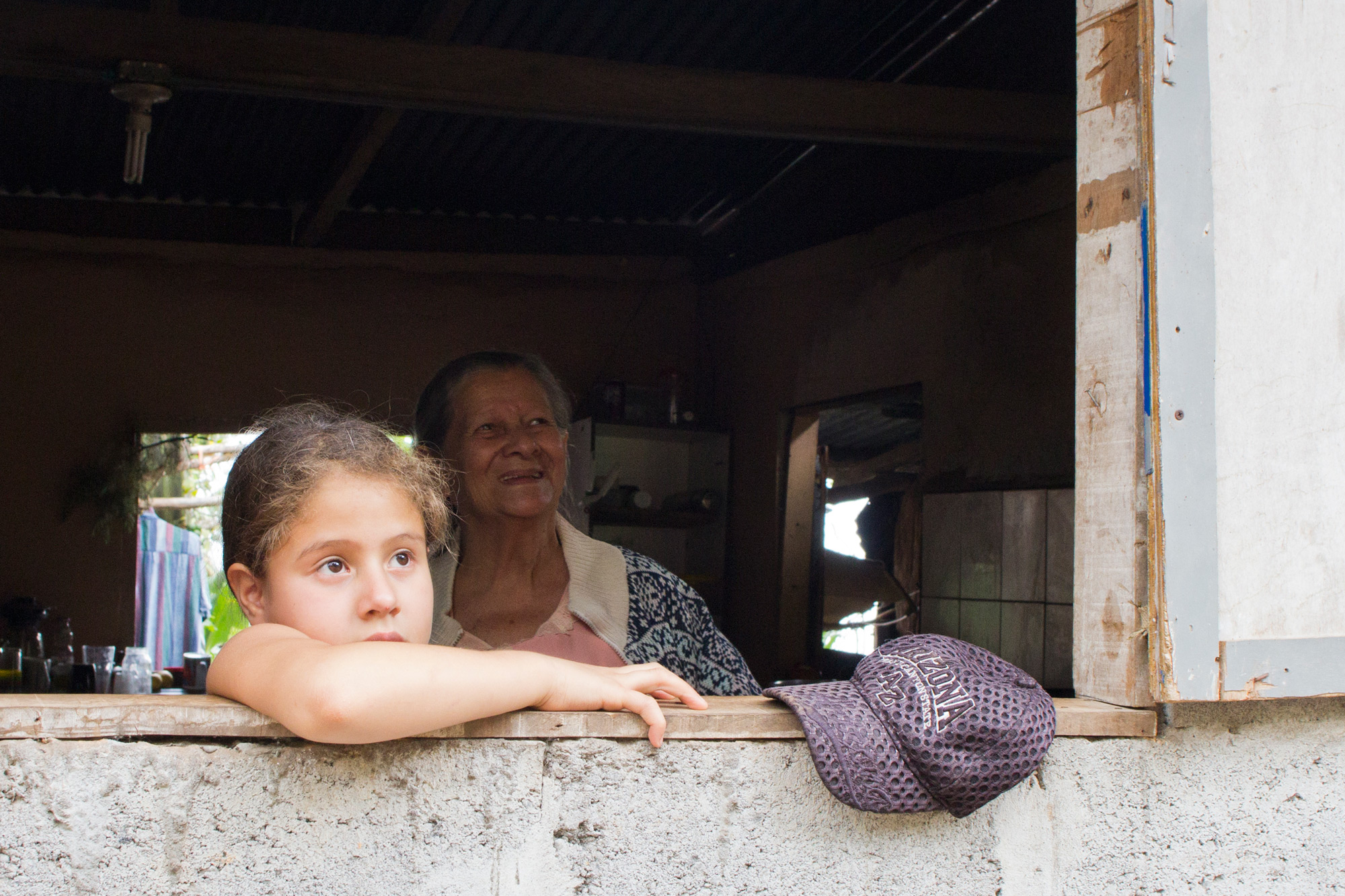 A farmhouse located a 4-hour hike from the thriving, rapidly modernizing town of Boquete. Axi, the head of the household, grew up in the one bedroom home, and now lives here with his mother, two brothers, sister, nephew and two nieces.