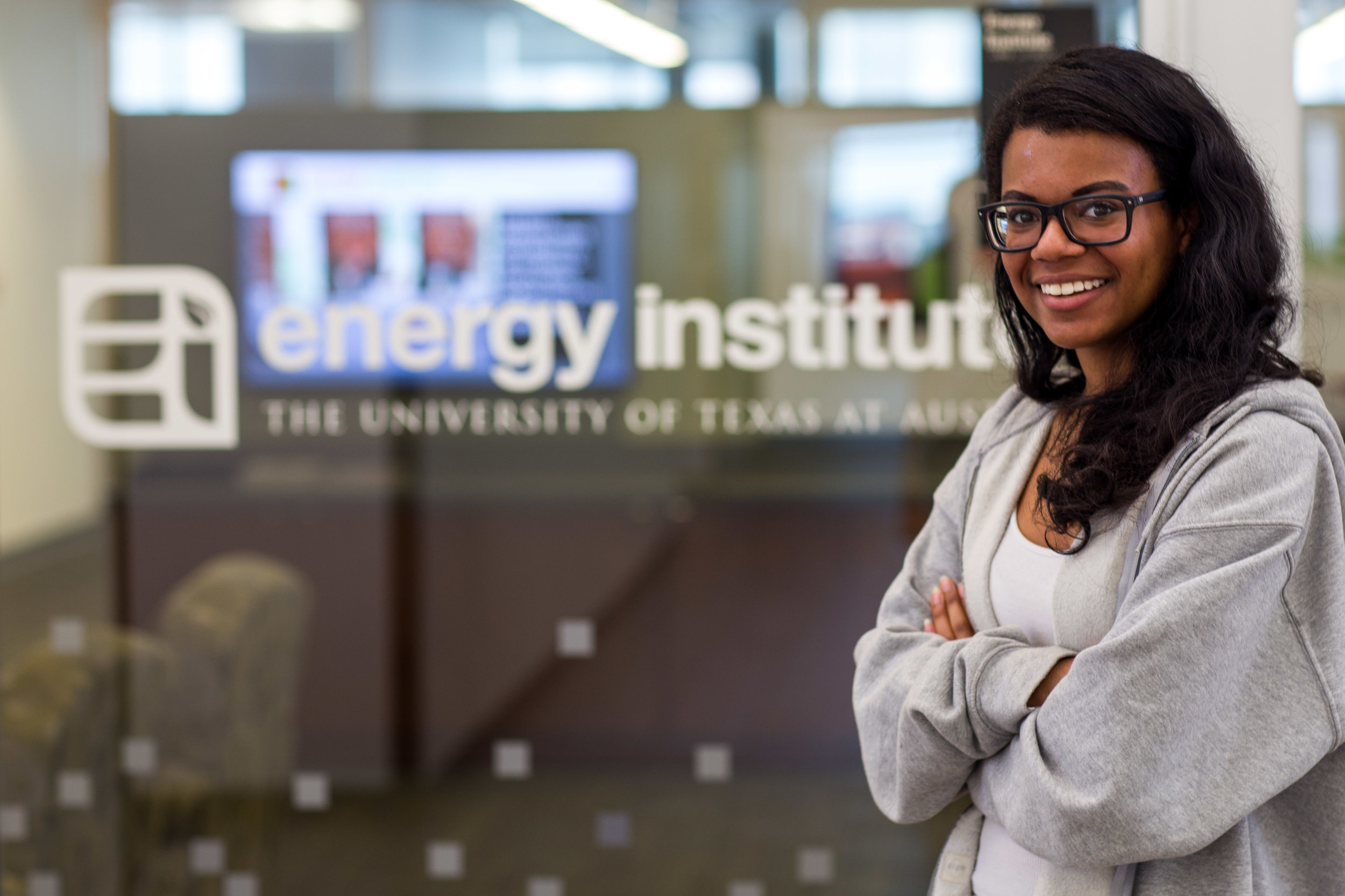 Journalism junior Alex Samuels stands outside of the UT Energy Institute, where she is currently an intern.