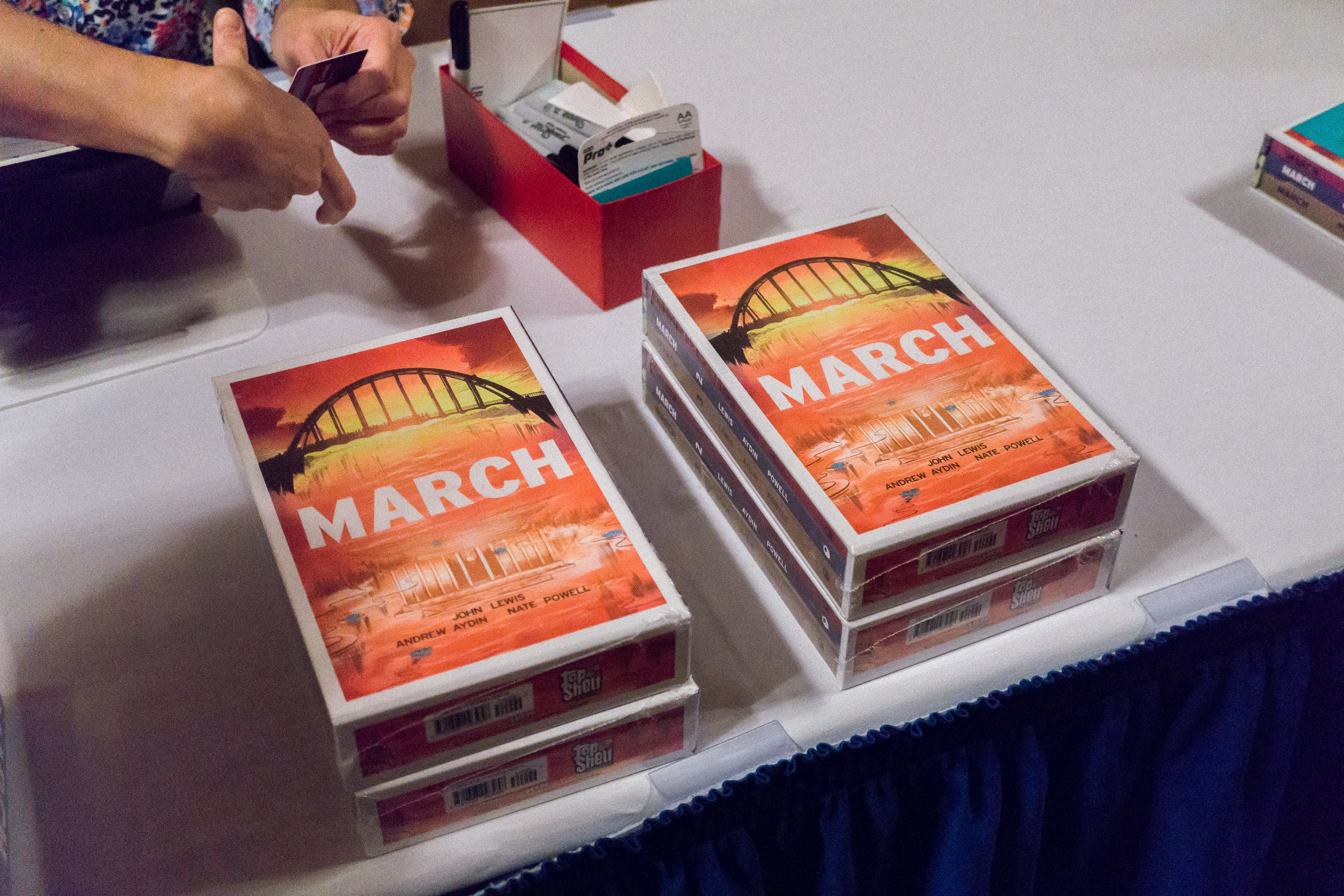 A copy of MARCH ON, a three part graphic novel that tells the story of Civil Rights activists and their commitments to justice and equality.