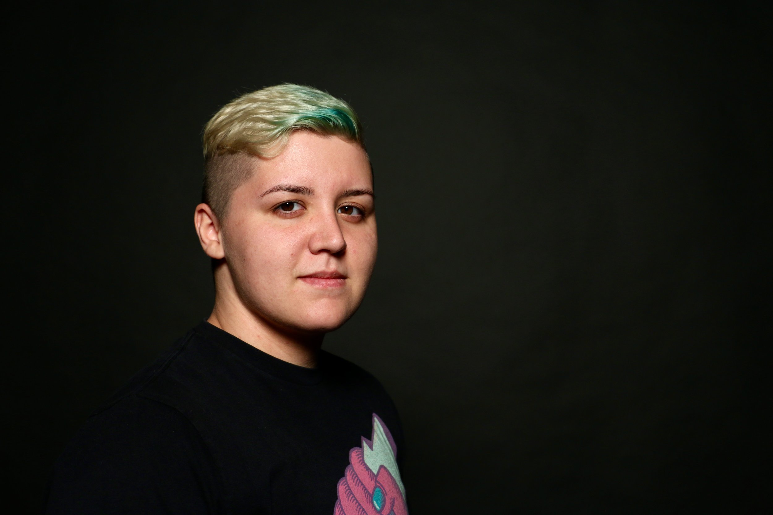 Goblet has died their hair multiple colors, currently enjoying a blue and bleach hairdo.