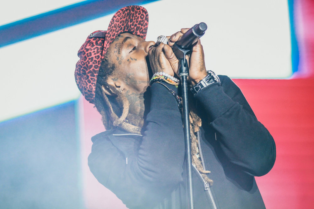   Lil Wayne fed off of the crowds energy as he performed famous throwbacks to start his set.  